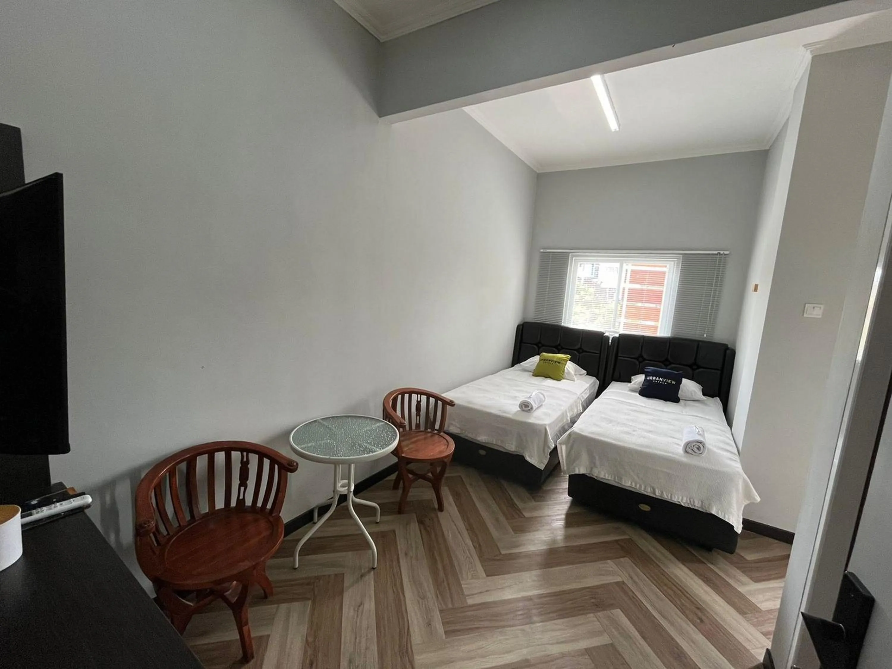 Bed in Urbanview Hotel The Tang Balikpapan by RedDoorz