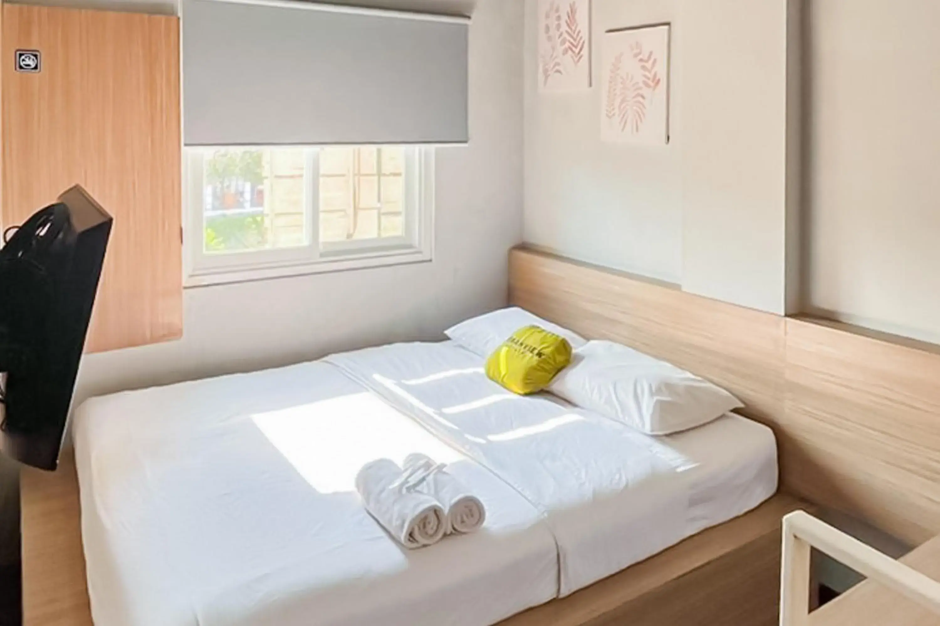 Superior Double Room in Urbanview Hotel The Tang Balikpapan by RedDoorz Superior Double Room in Urbanview Hotel The Tang Balikpapan by RedDoorz