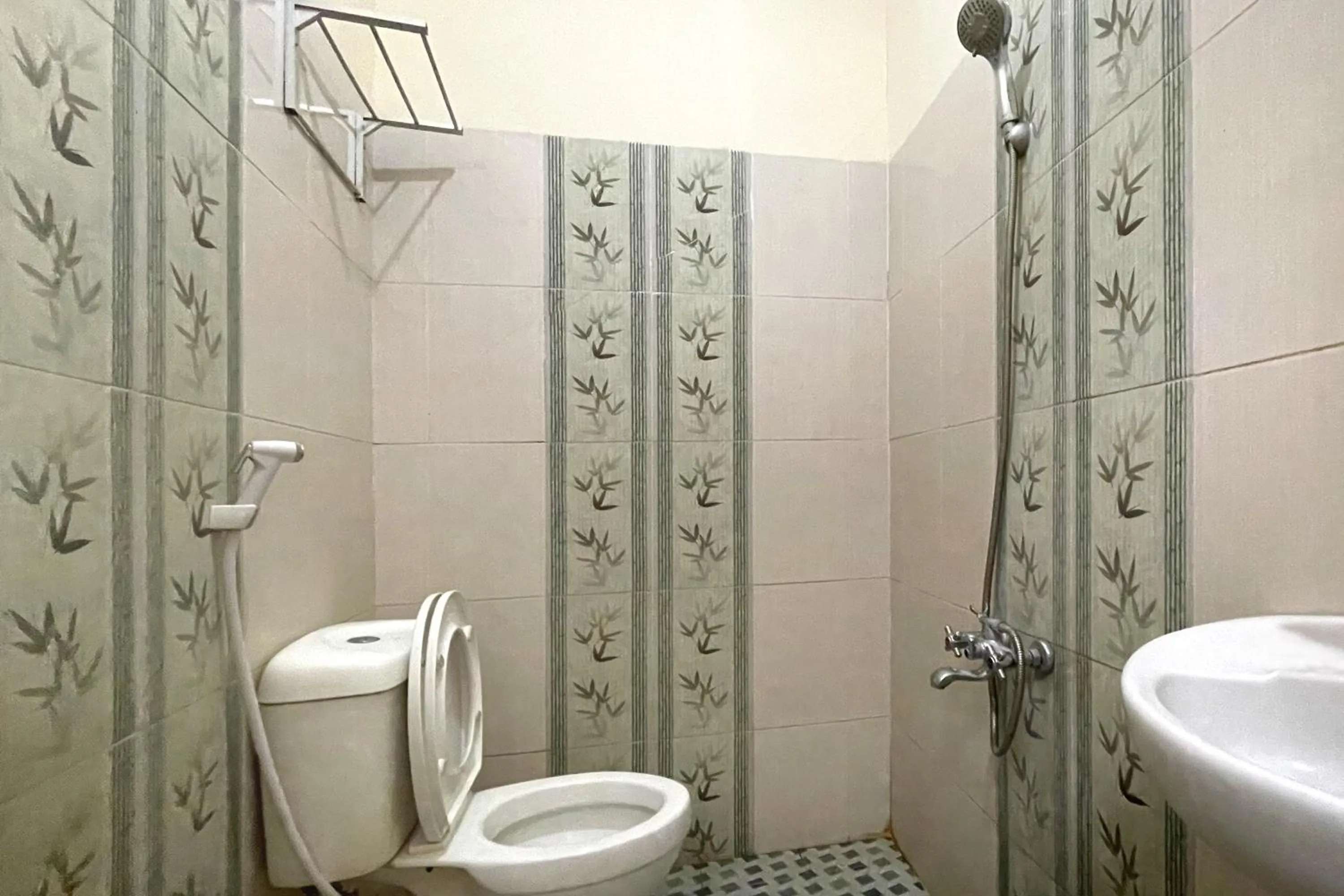 Bathroom in Urbanview Hotel Harapan Palopo