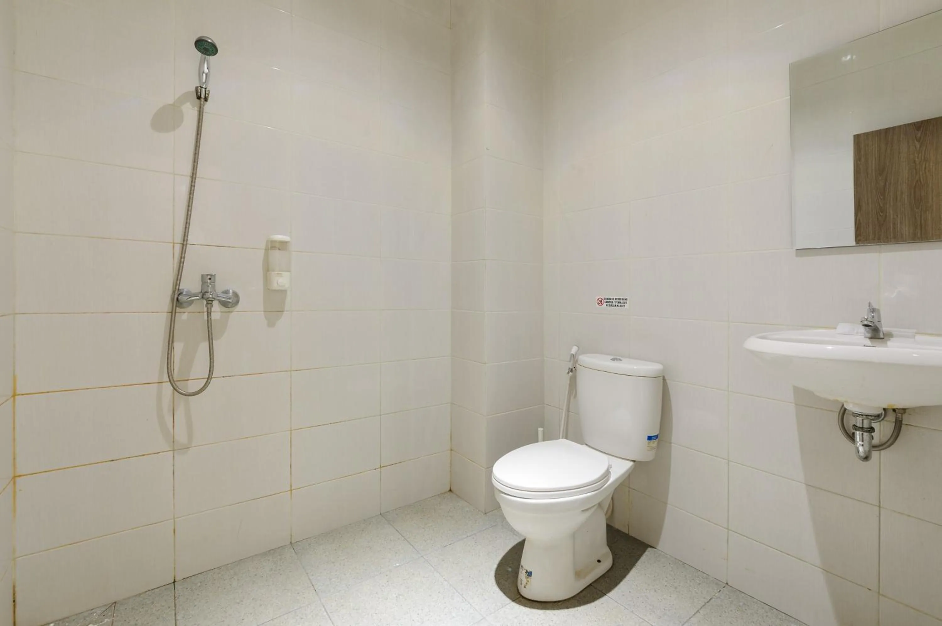 Bathroom in Sans Hotel Max Living Cengkareng