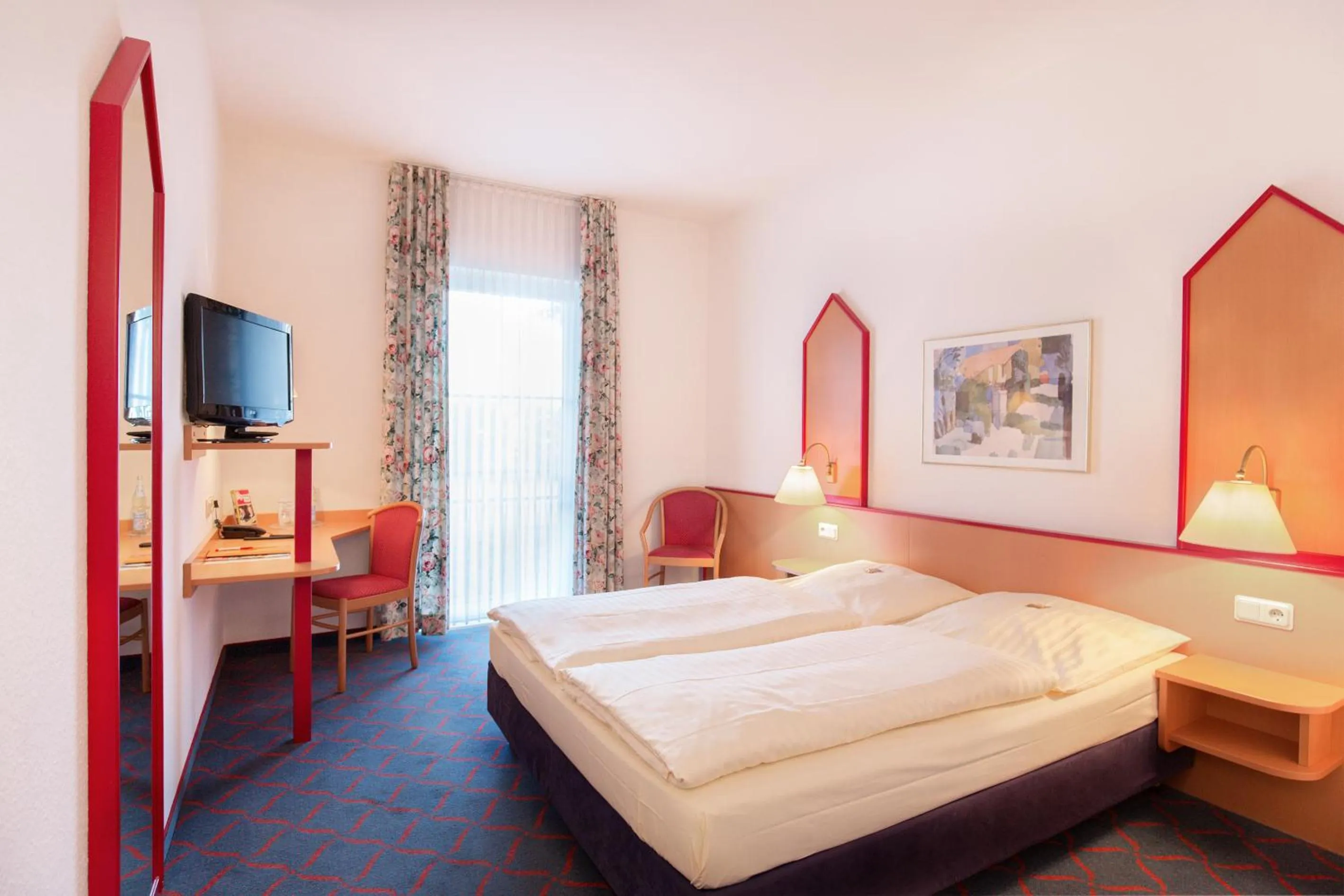 Photo of the whole room, Bed in Hotel Montana Lauenau