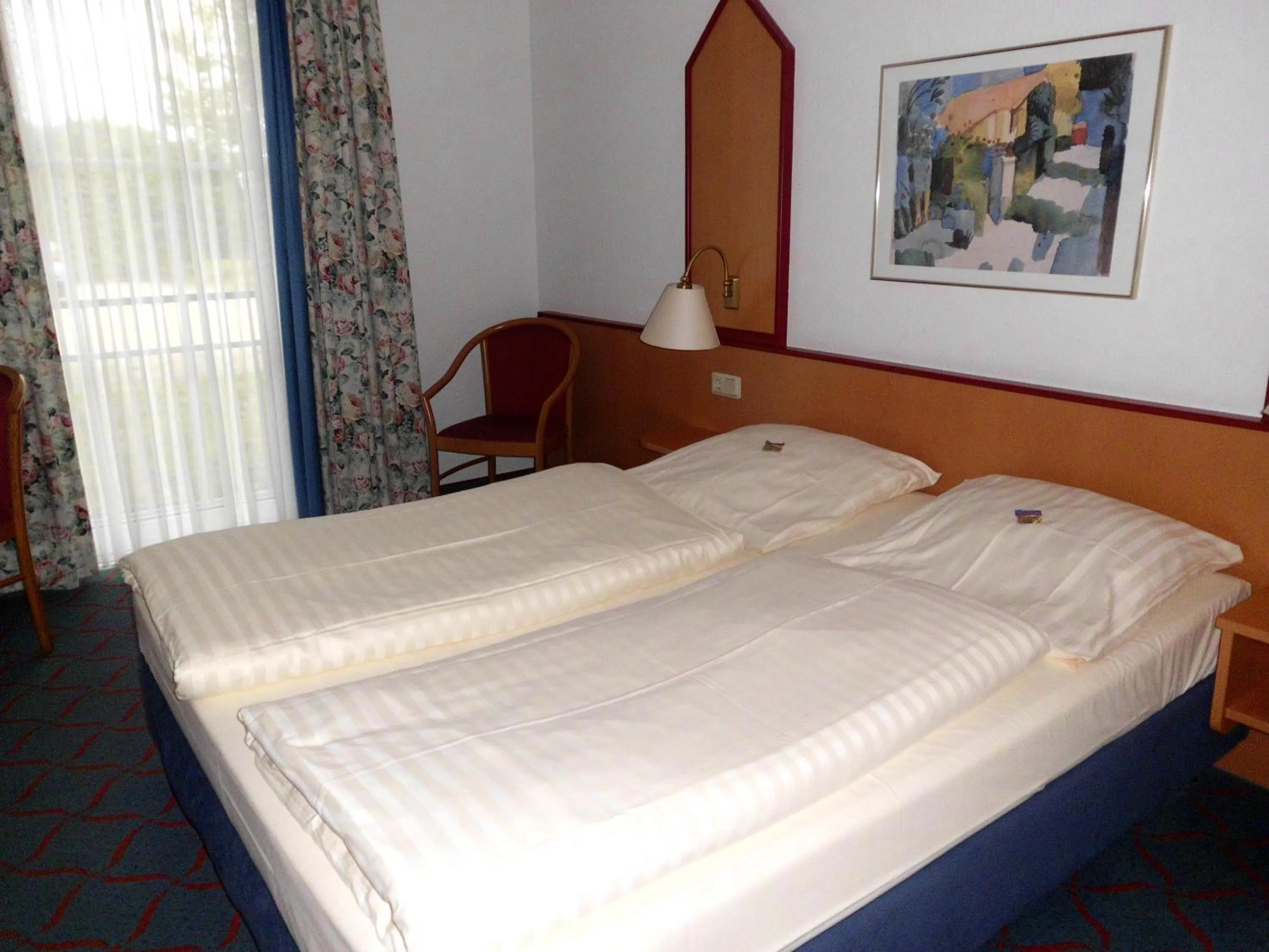 Bed in Hotel Montana Lauenau