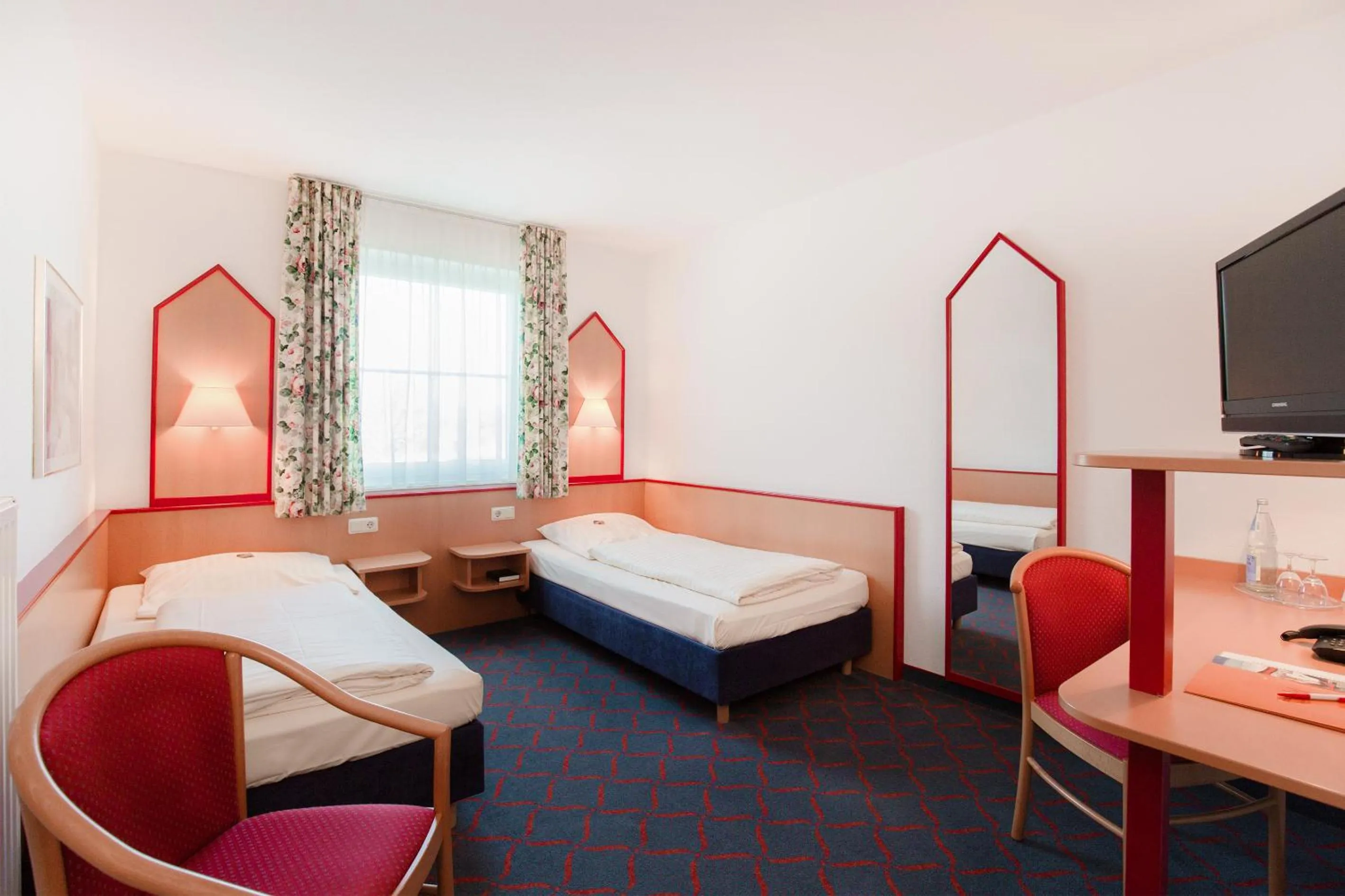 Photo of the whole room, Bed in Hotel Montana Lauenau