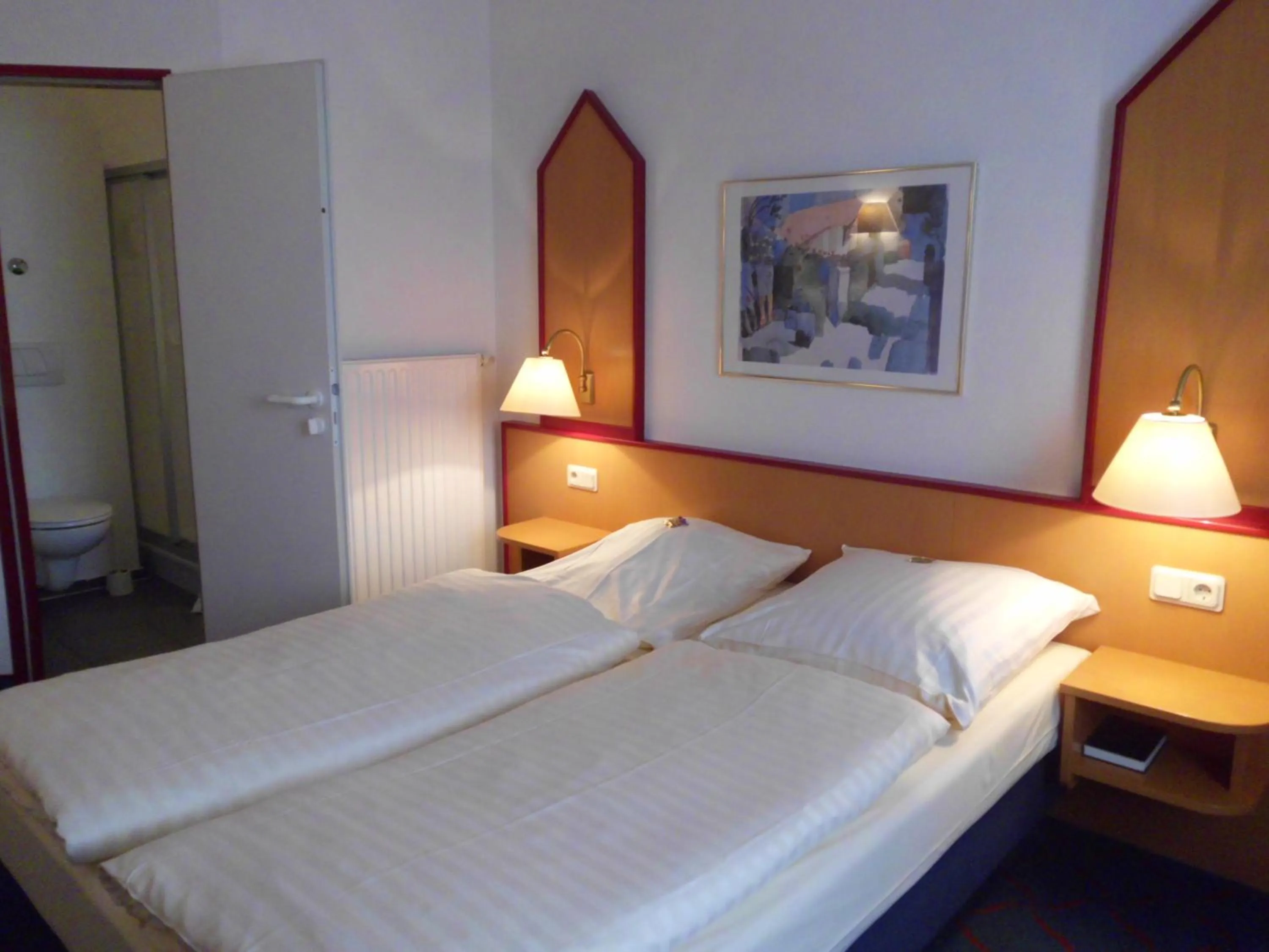 Photo of the whole room, Bed in Hotel Montana Lauenau