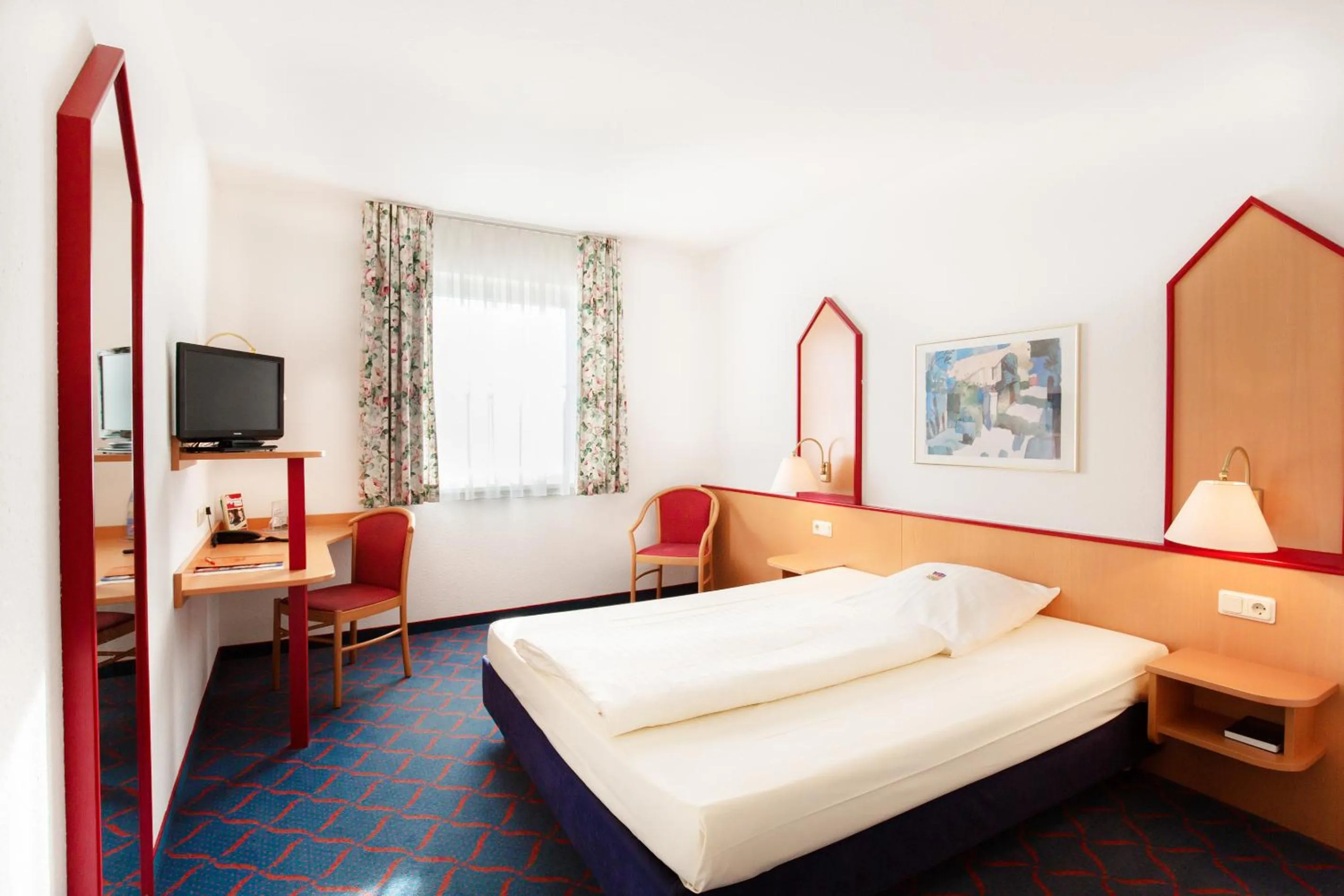 Photo of the whole room, Bed in Hotel Montana Lauenau