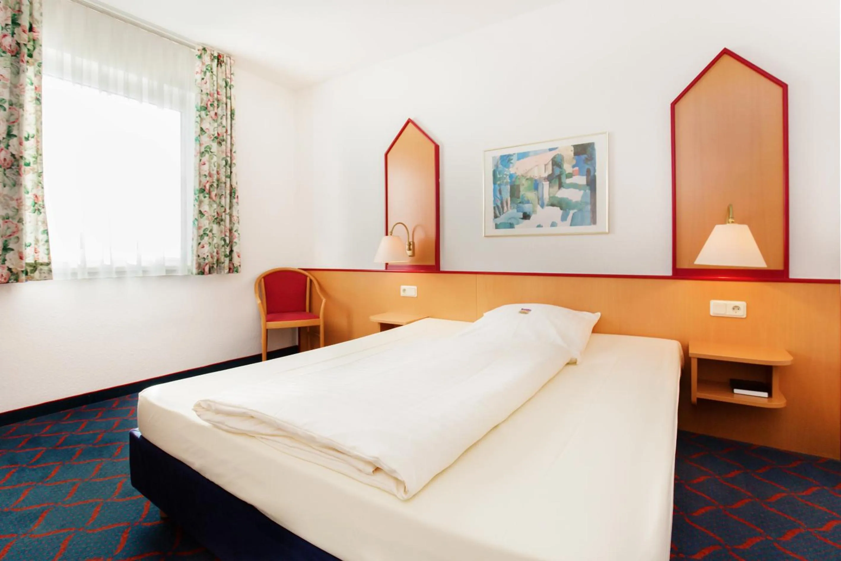 Photo of the whole room, Bed in Hotel Montana Lauenau
