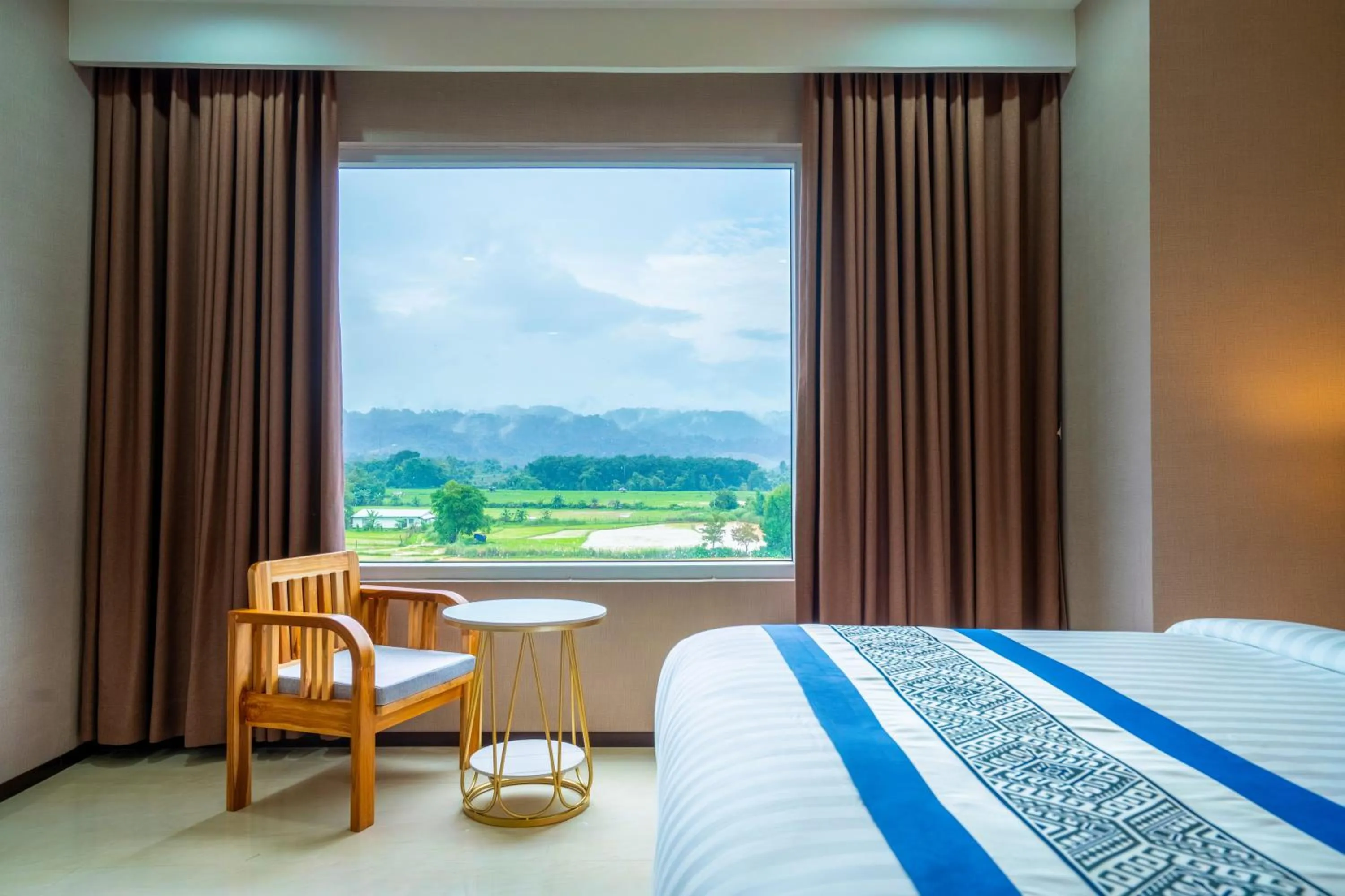 Bed in S Vangvieng Boutique Hotel