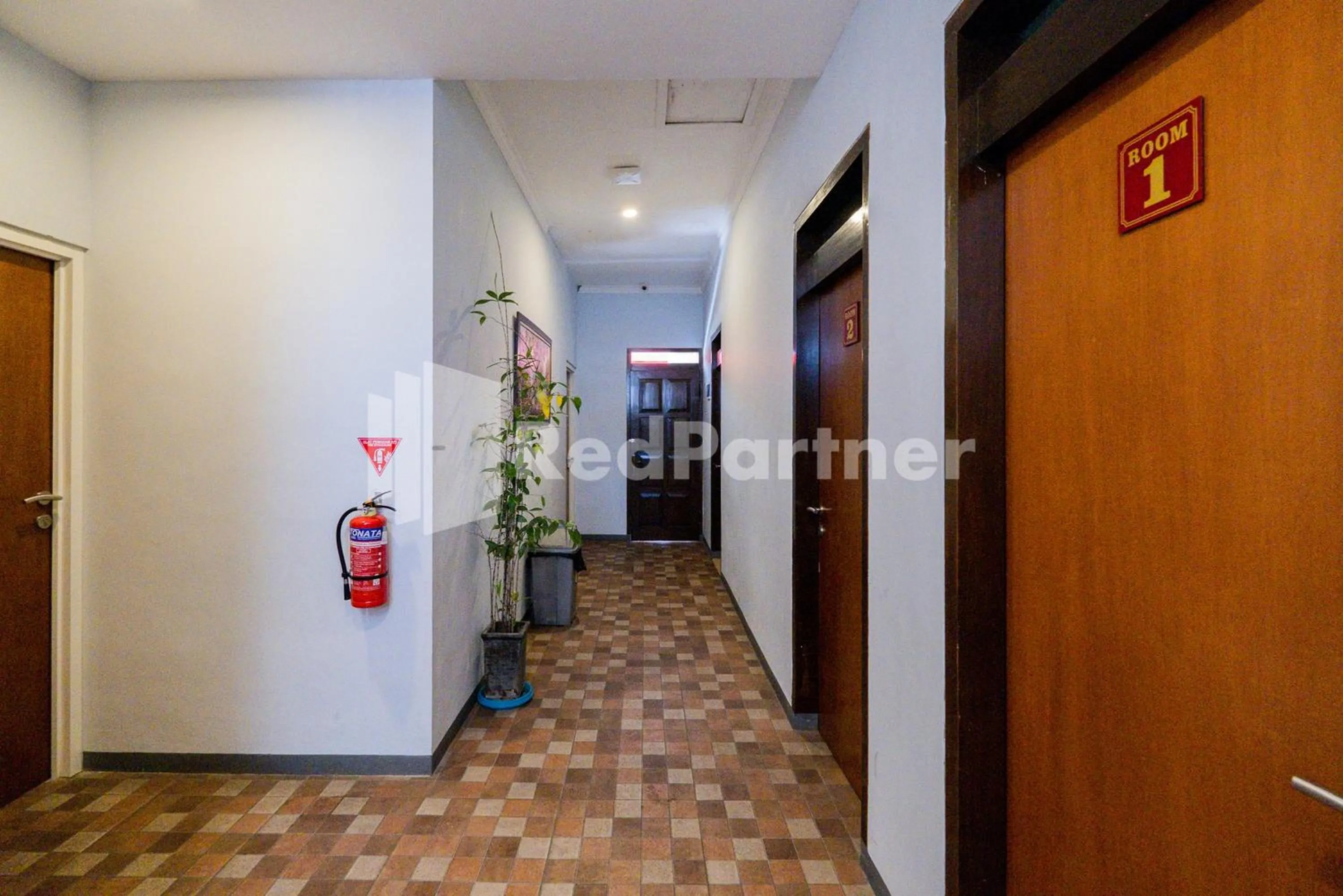 Property building in Swun Stay Inn At Sawahan Mitra RedDoorz