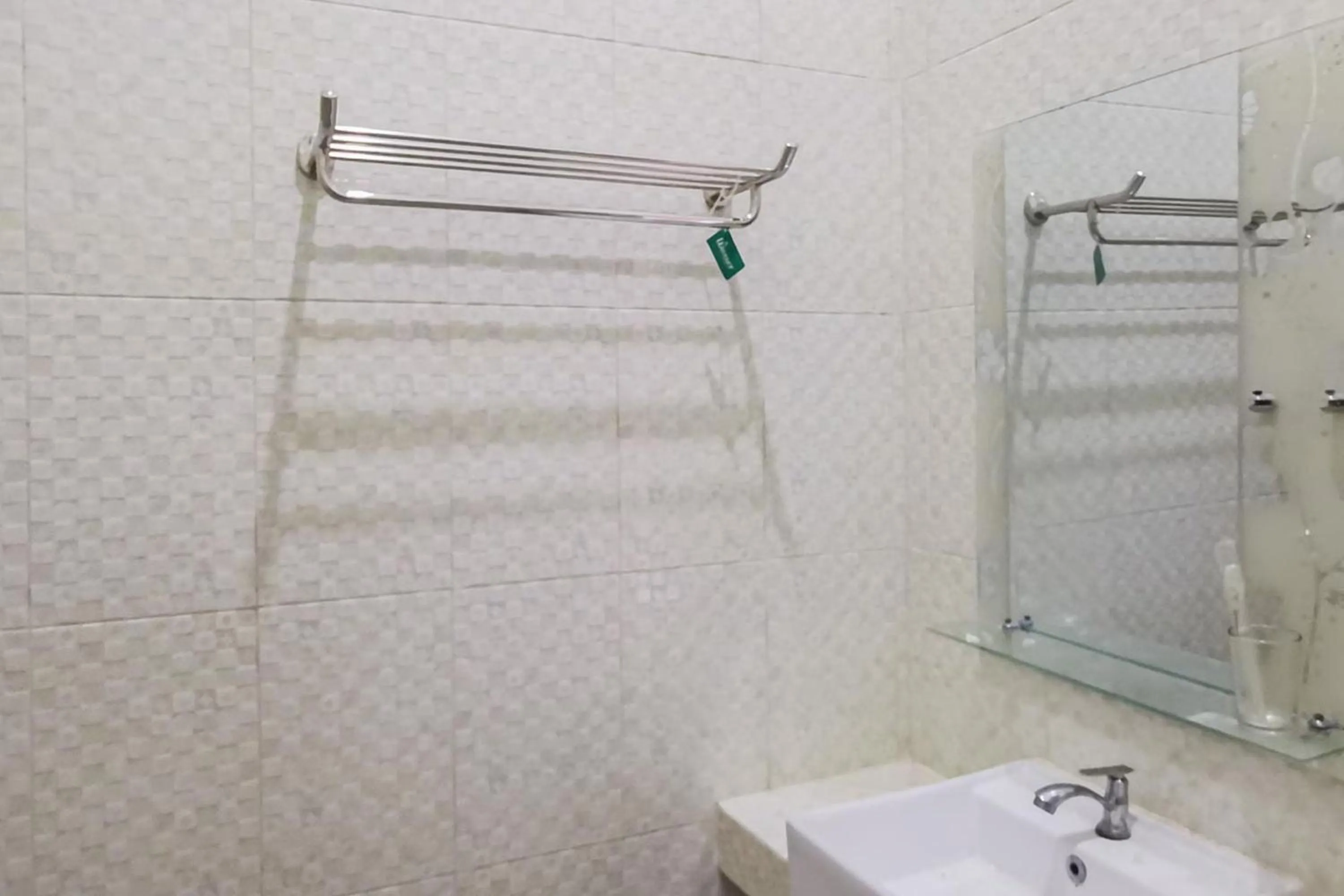 Bathroom in RedDoorz near Pantai Pancer Door Pacitan