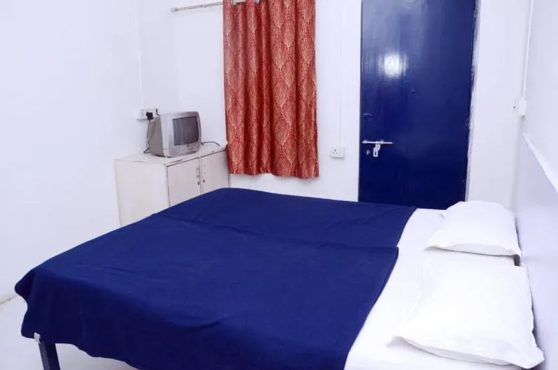 Bed in Hotel Sairam Lodge