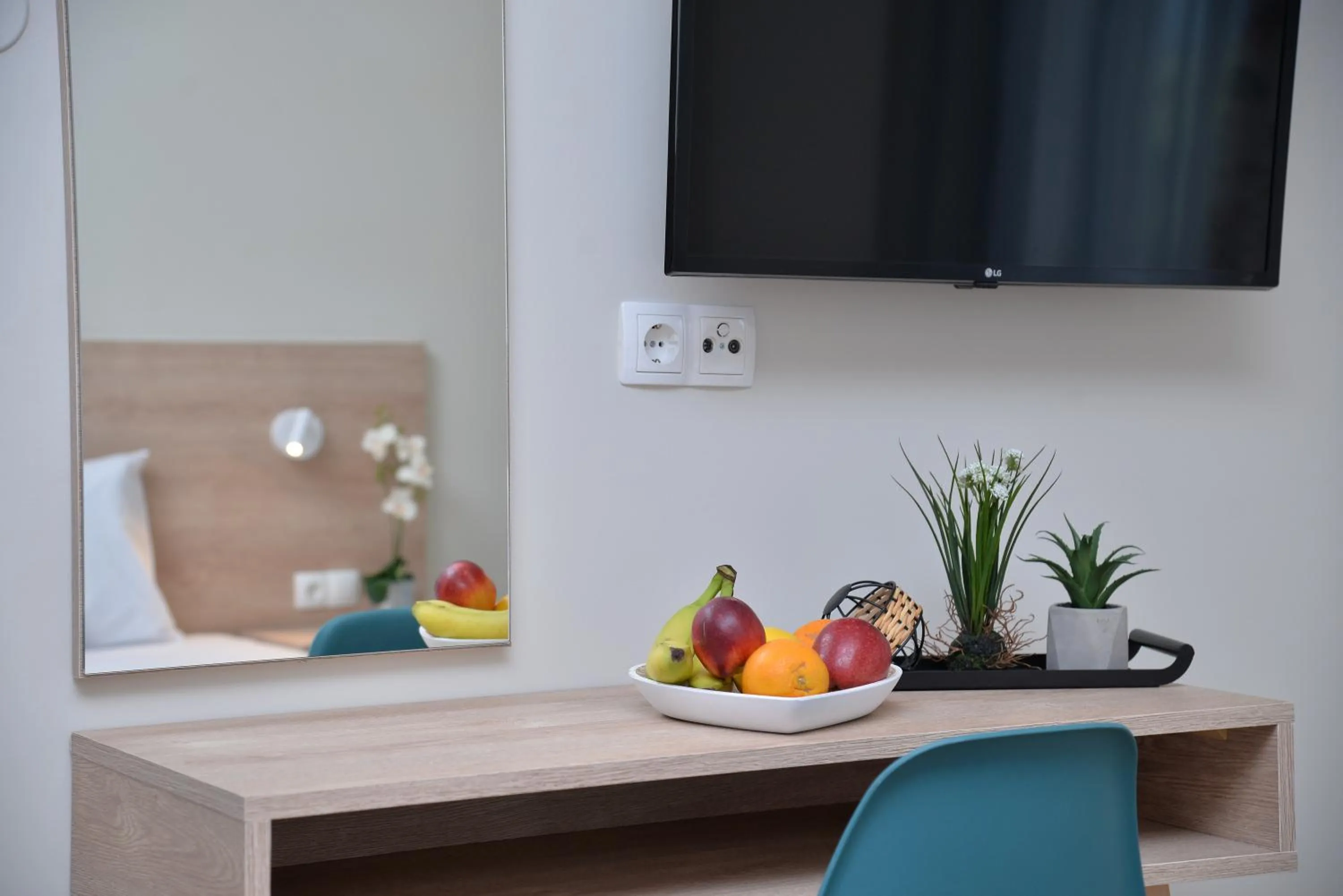 TV and multimedia in Niel Holiday Apartments, Panel Hospitality Homes & Villas