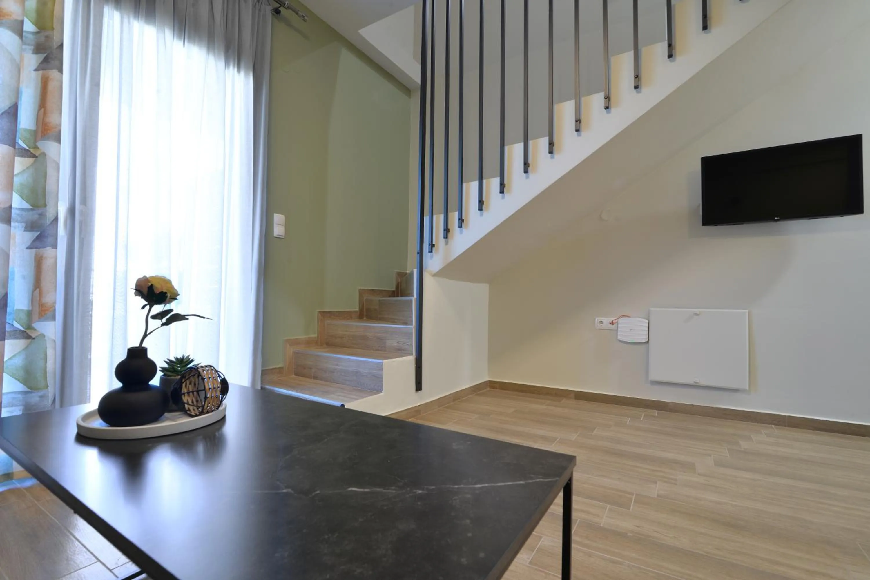 Communal lounge/ TV room in Niel Holiday Apartments, Panel Hospitality Homes & Villas