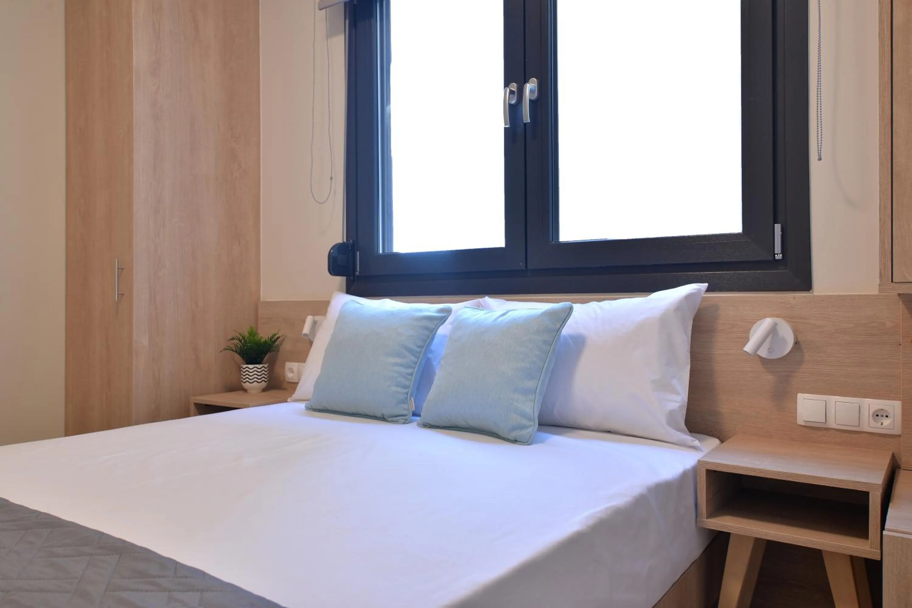 Bed in Niel Holiday Apartments, Panel Hospitality Homes & Villas