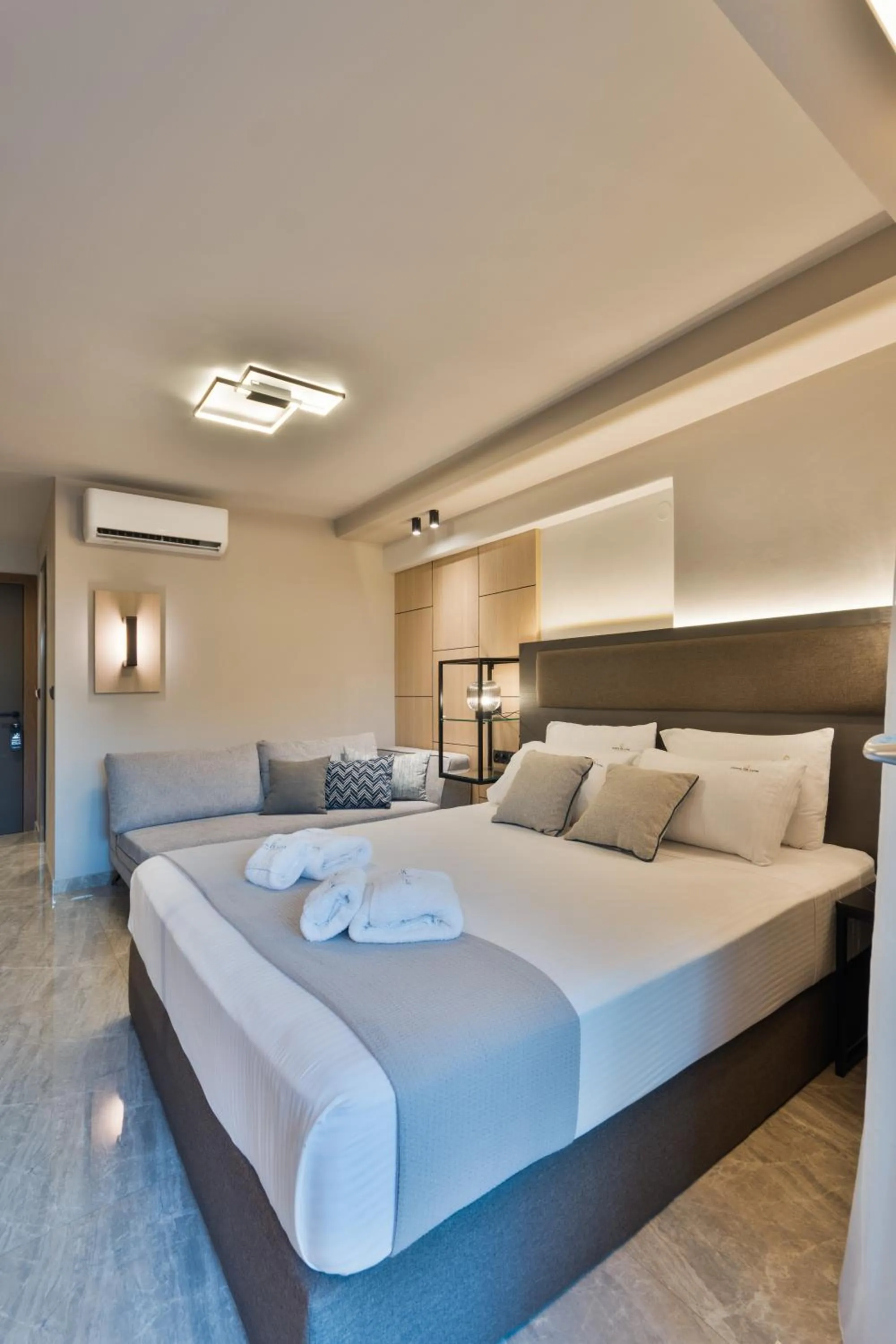 Bed in Costa De Luxe Suites