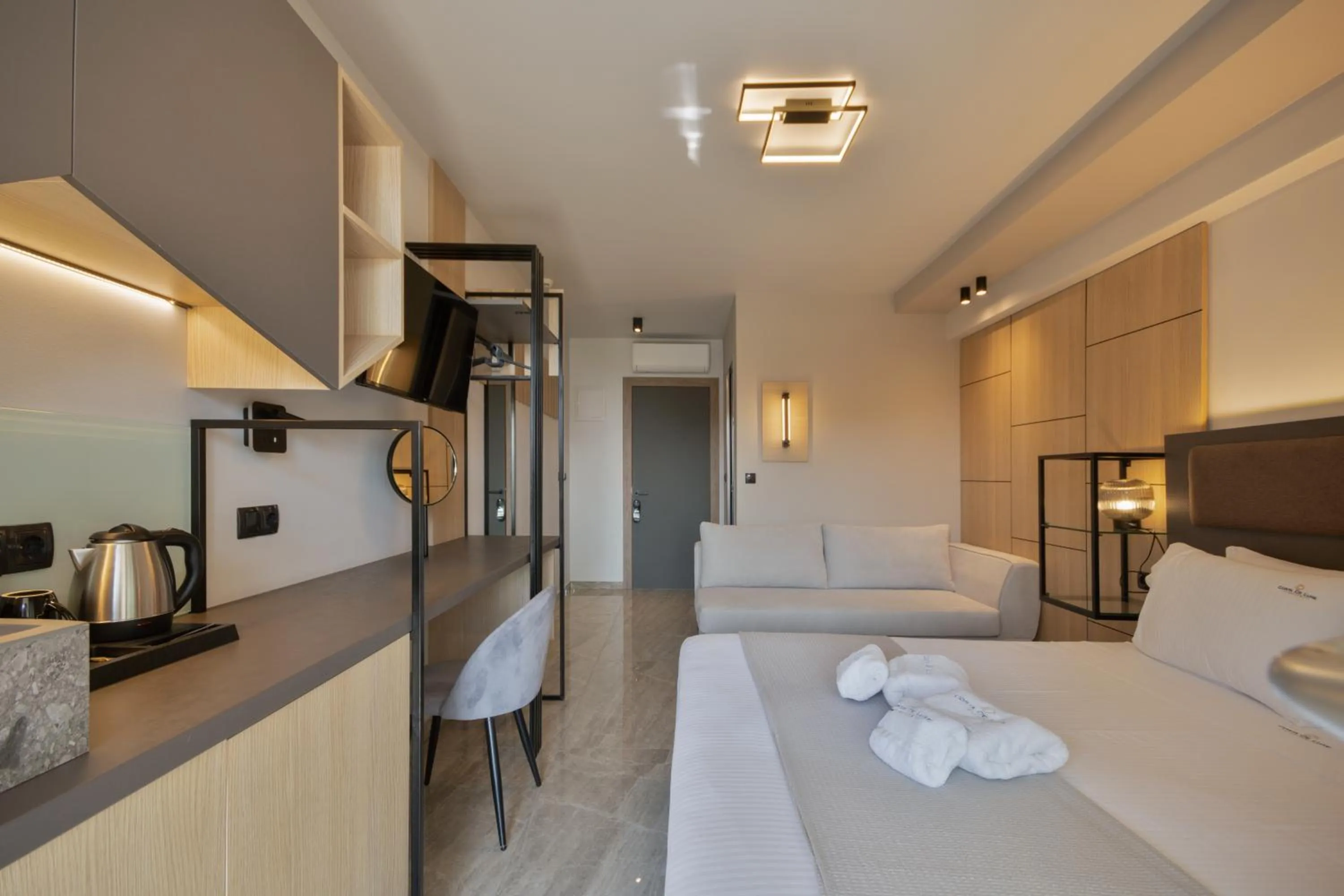 Kitchen or kitchenette, Bed in Costa De Luxe Suites