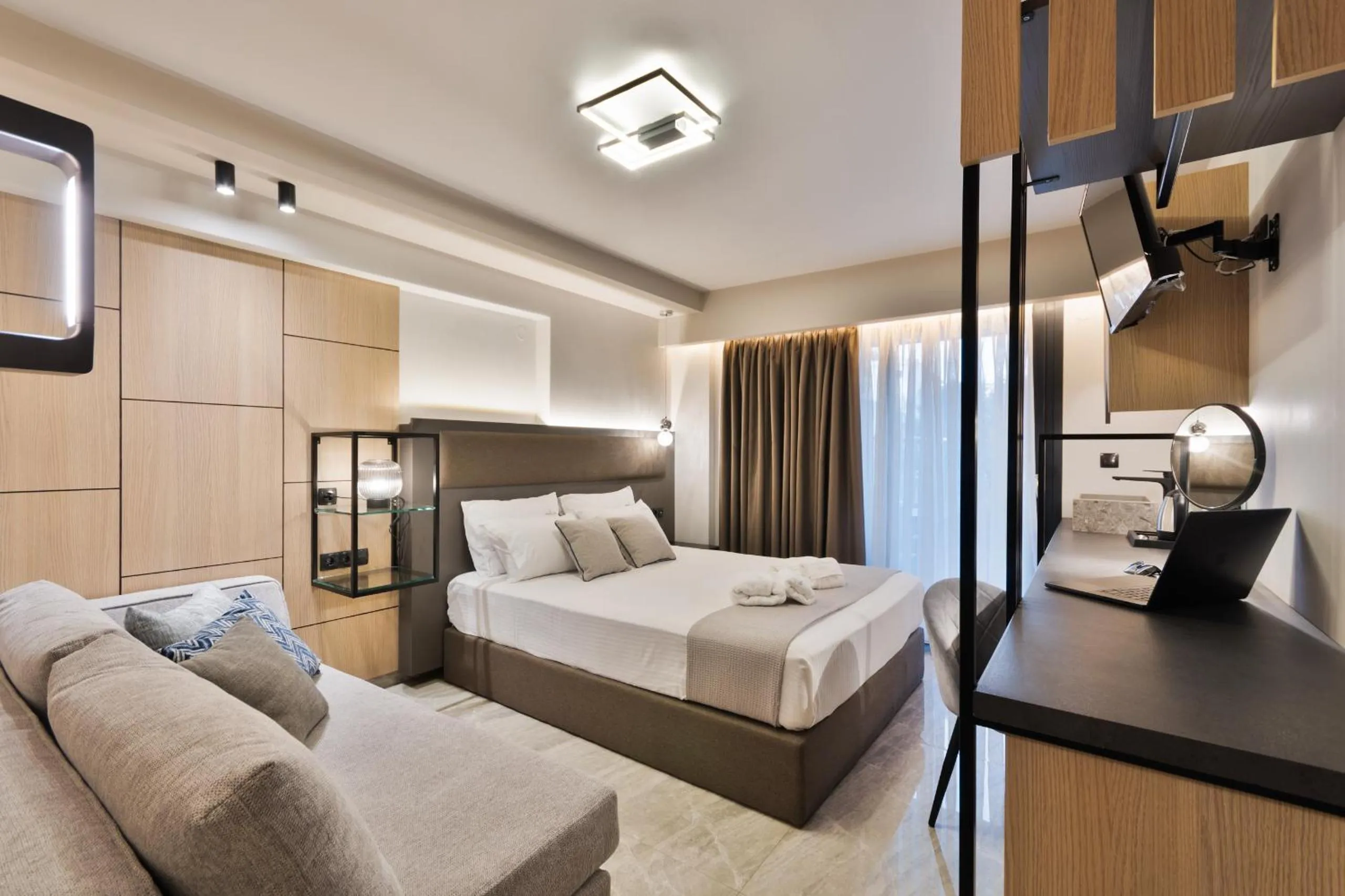 Bed in Costa De Luxe Suites