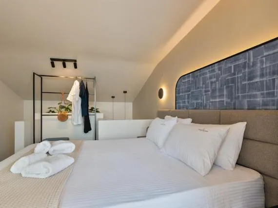 Bed in Costa De Luxe Suites