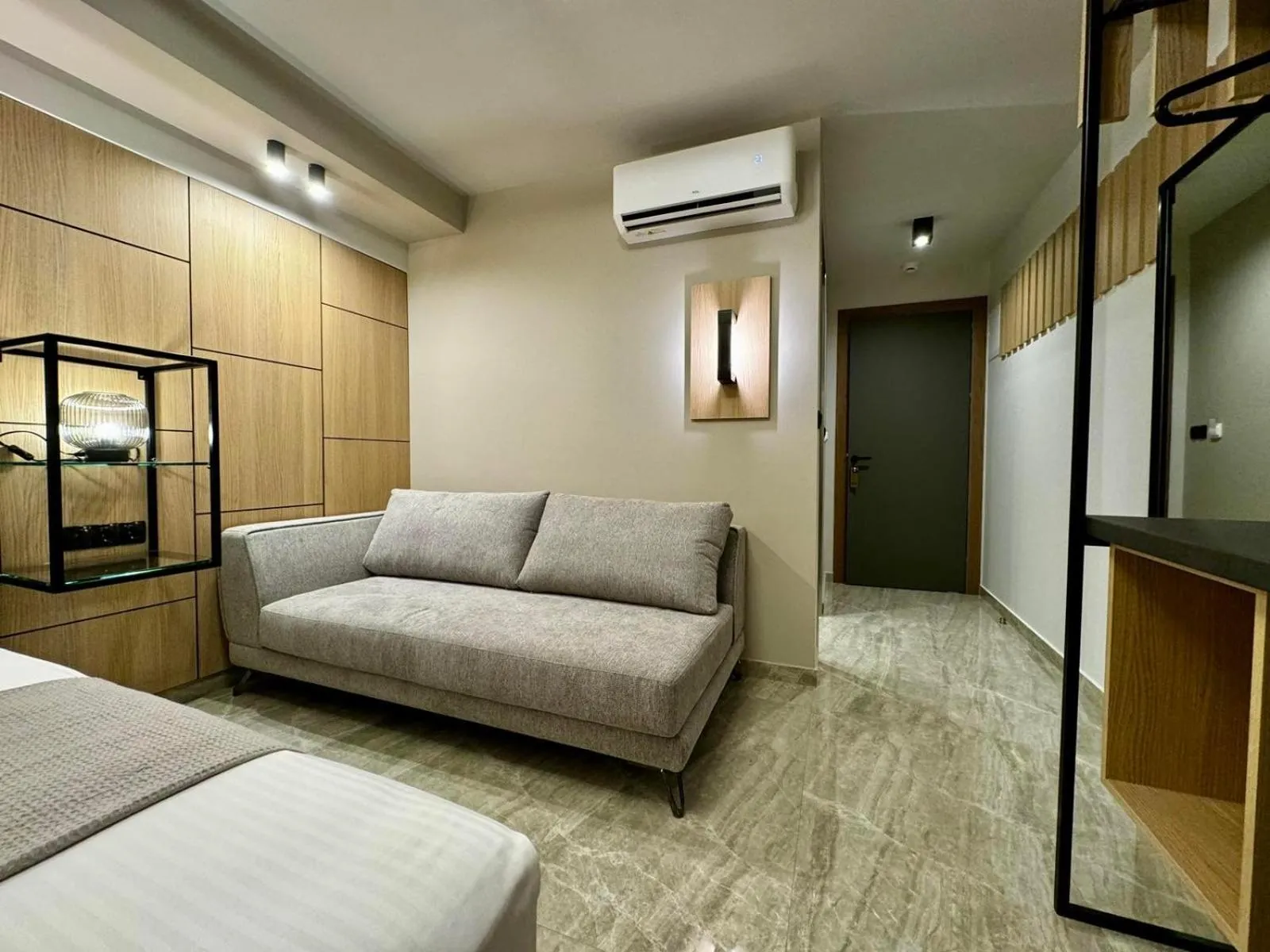 Seating area, Bed in Costa De Luxe Suites