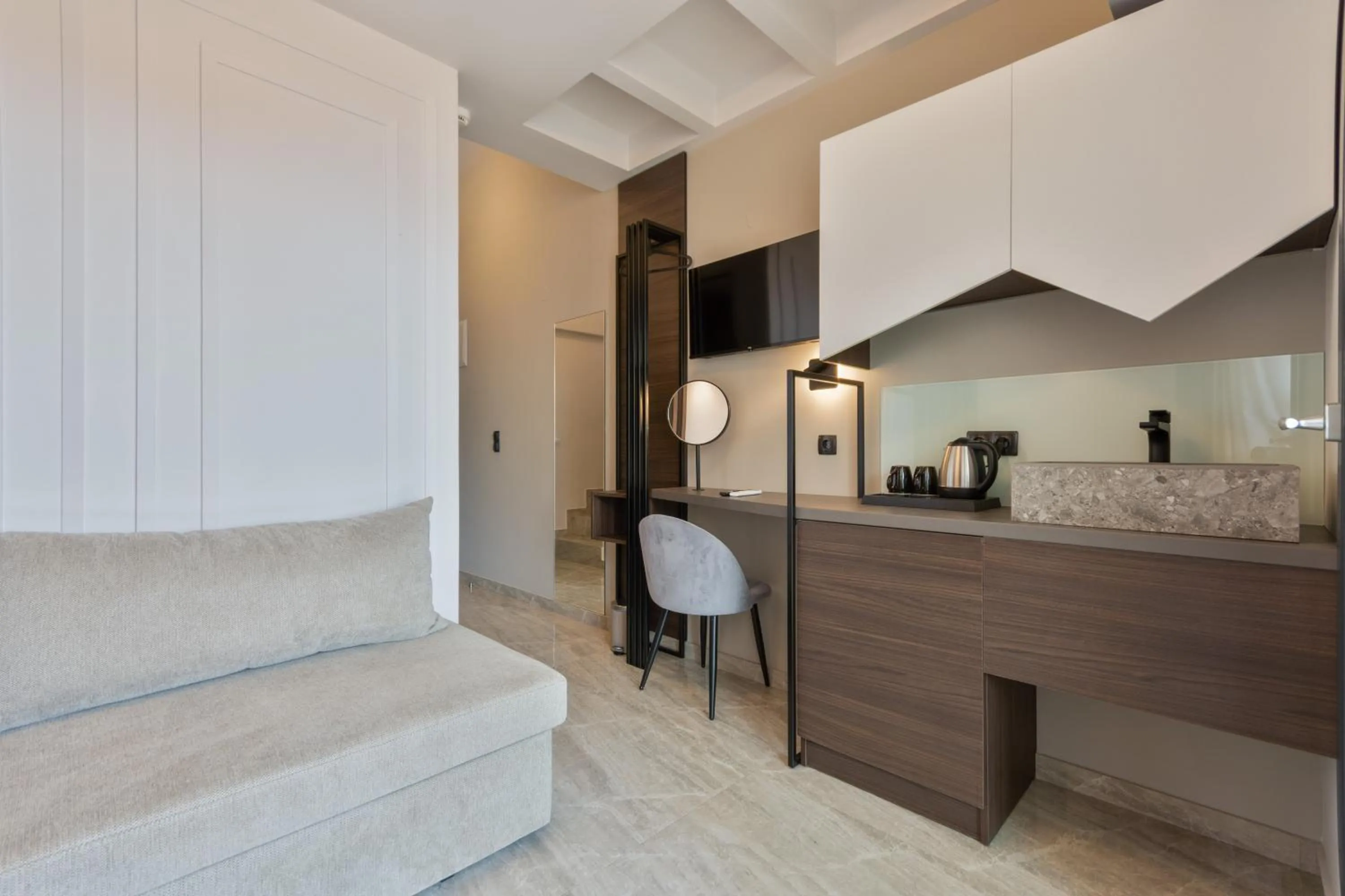 Kitchen or kitchenette in Costa De Luxe Suites