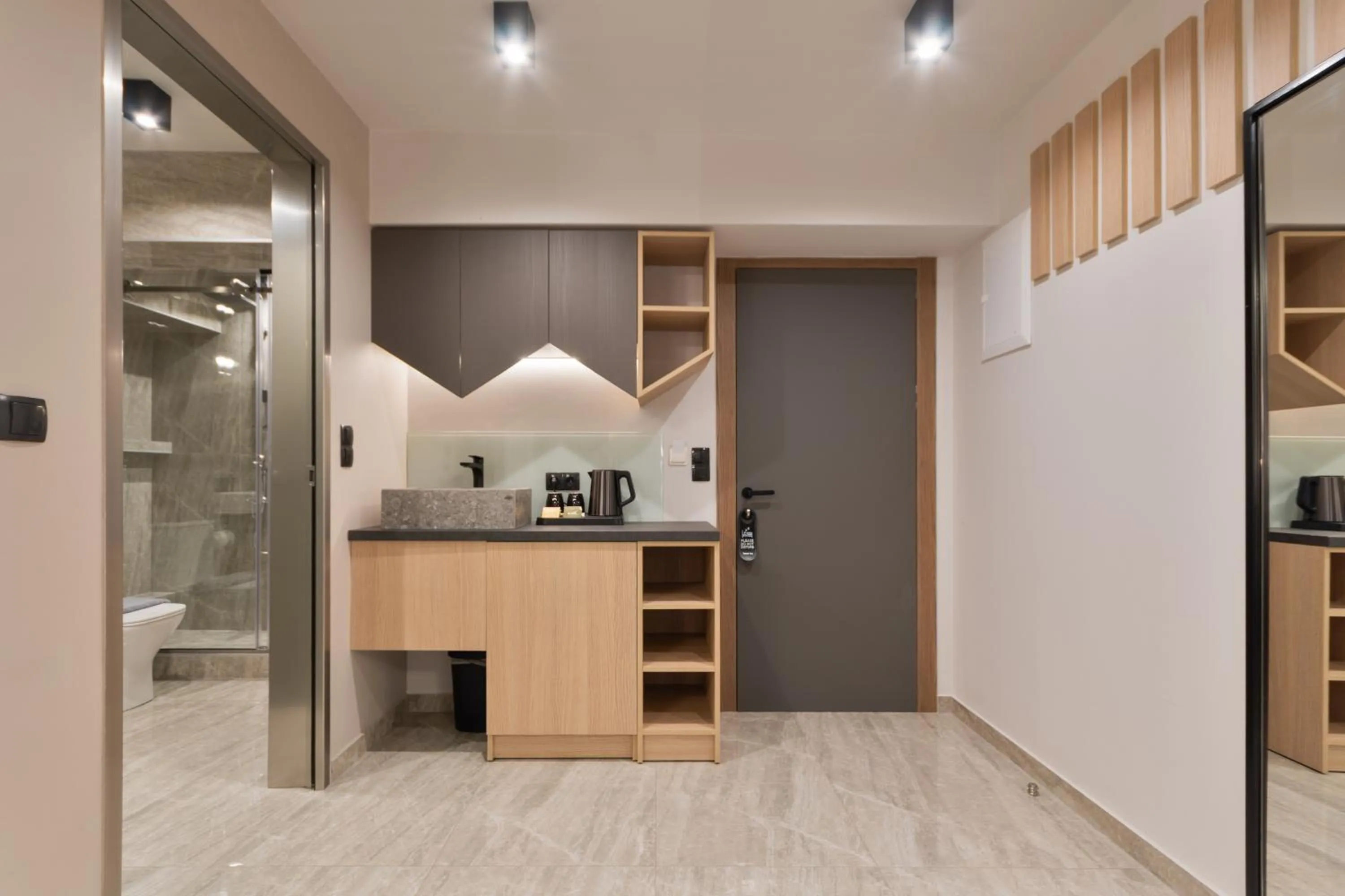 Kitchen or kitchenette in Costa De Luxe Suites