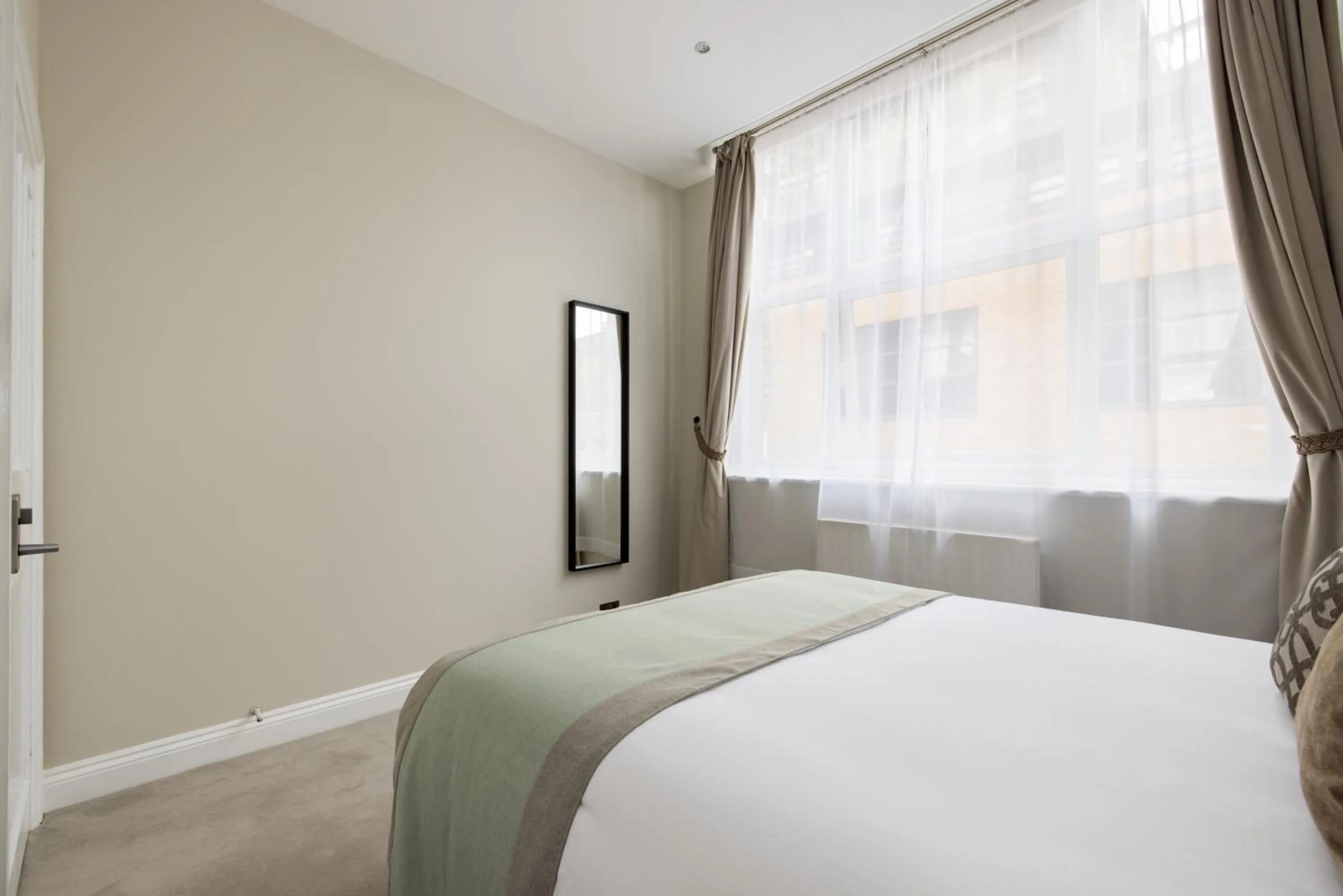 Bed in Avari Apartments - Hatton Collection