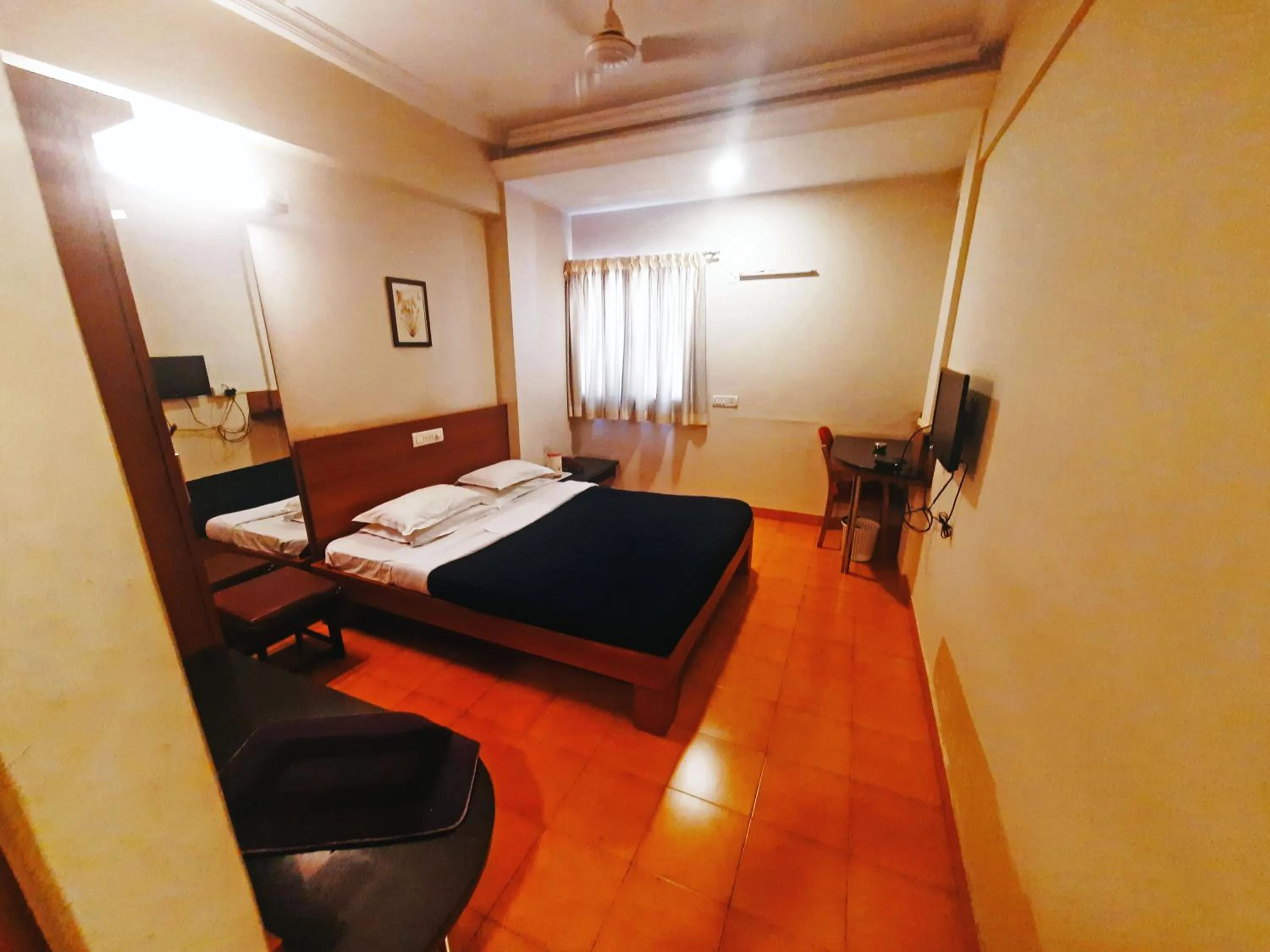 Bedroom in Sanman Deluxe Lodge