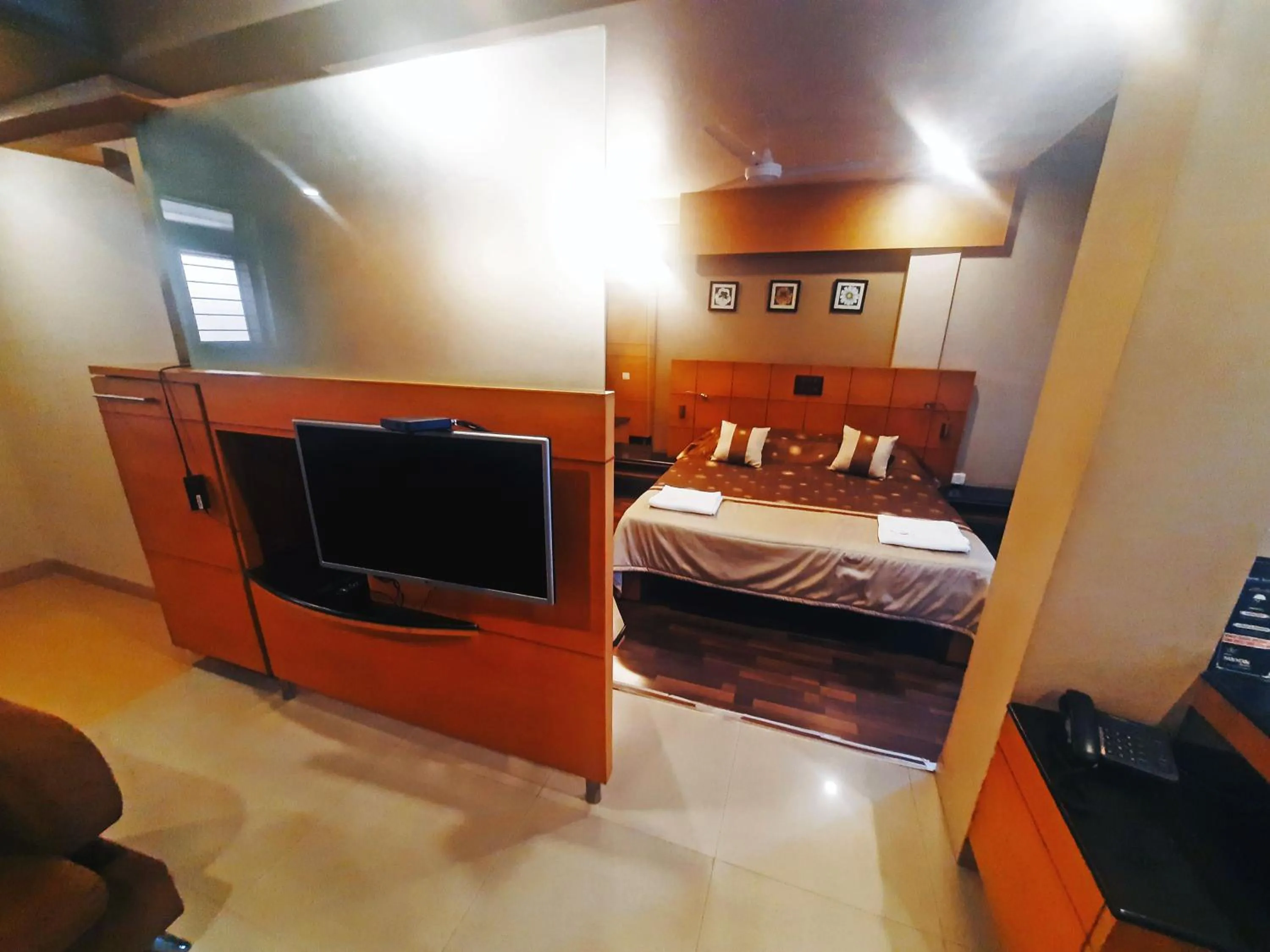 Bedroom in Sanman Deluxe Lodge