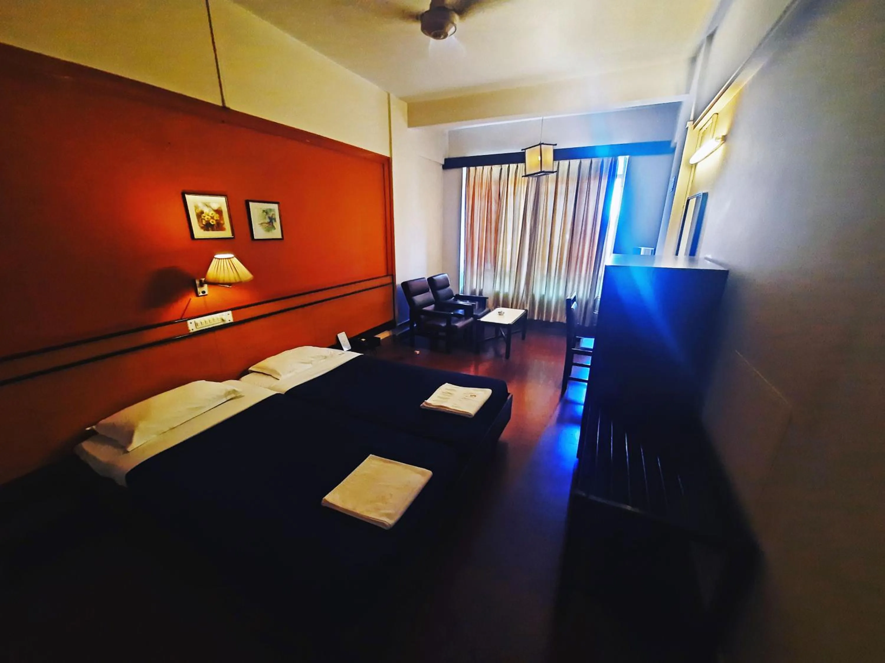 Bedroom in Sanman Deluxe Lodge