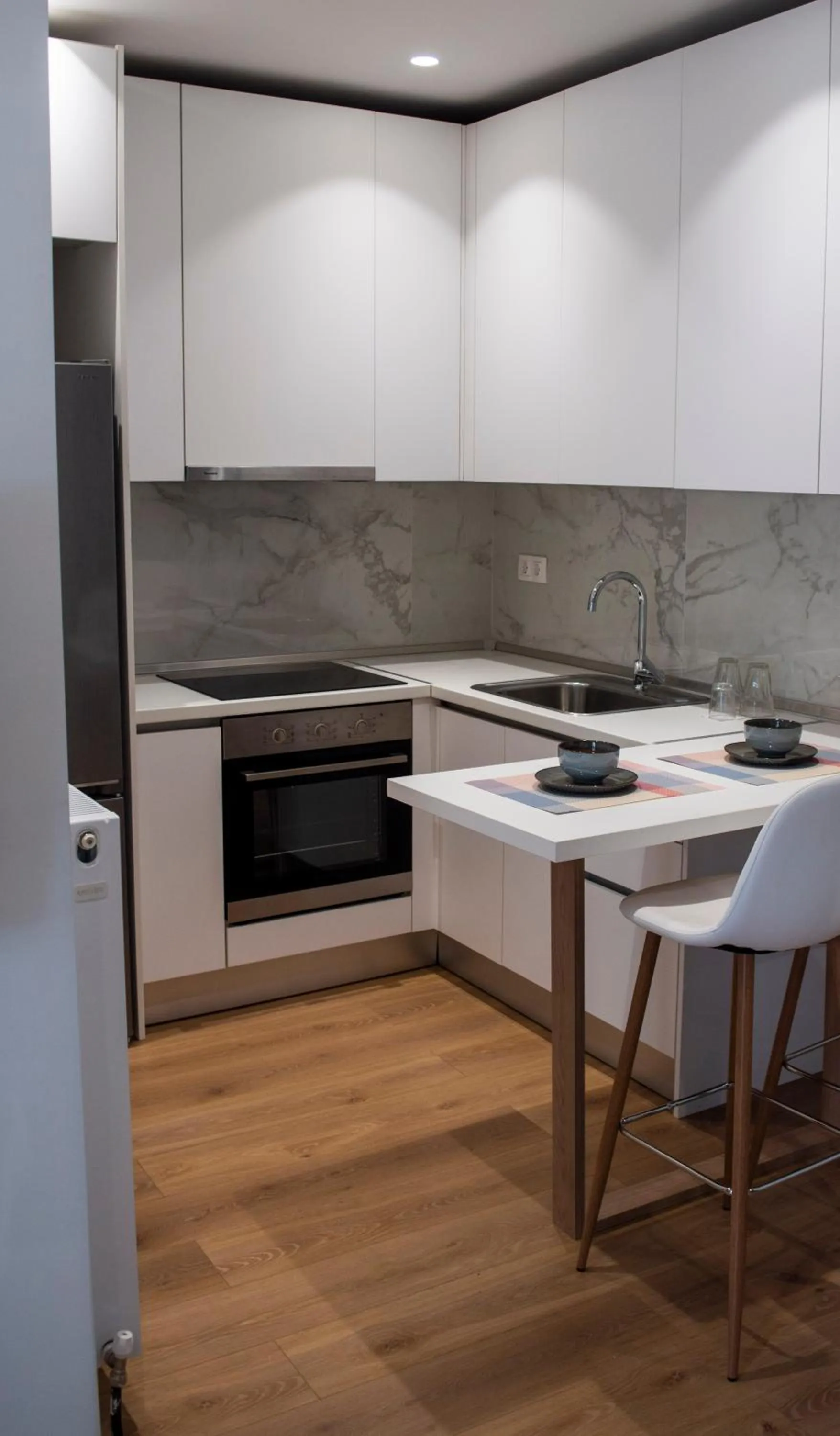 kitchen in The Caravan Apartments