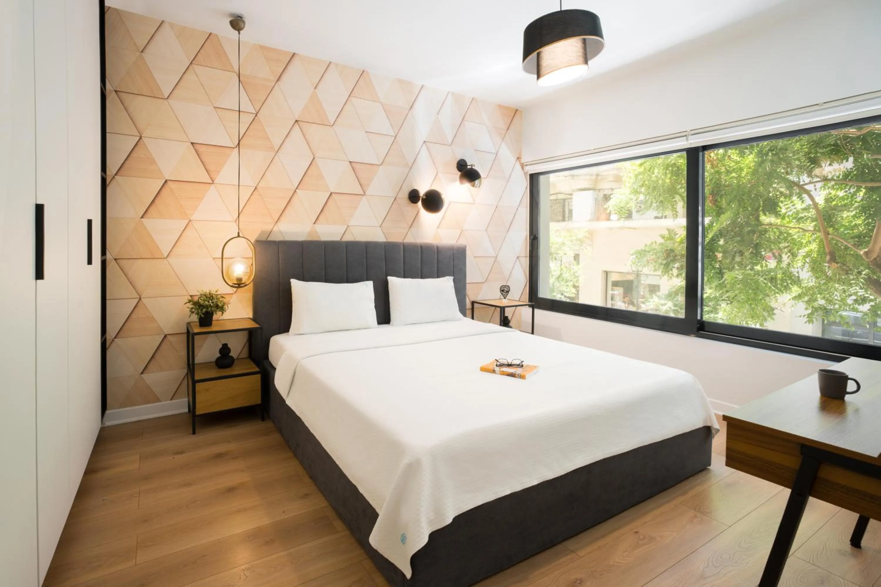 Bed in The Caravan Apartments