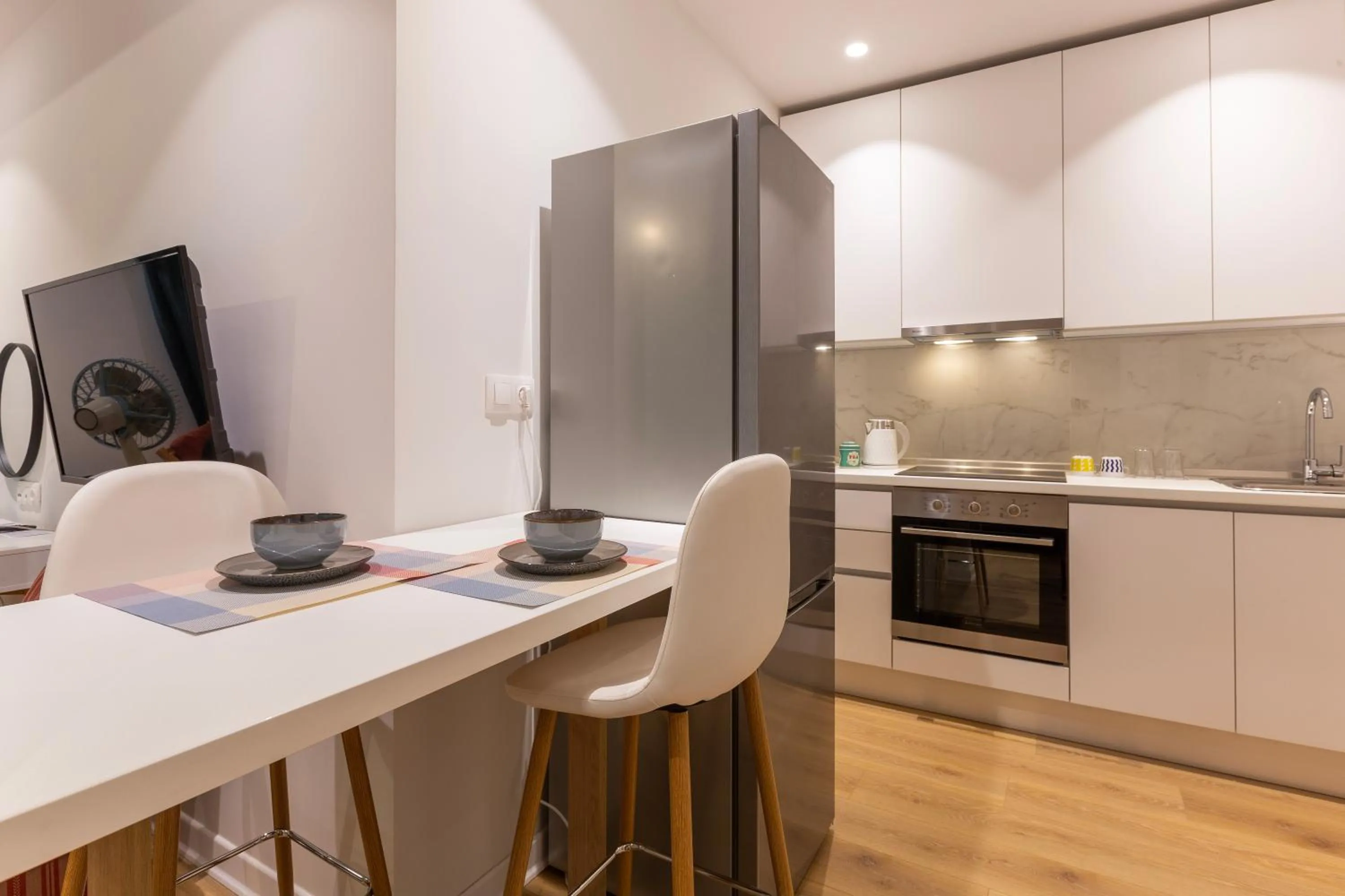 kitchen in The Caravan Apartments