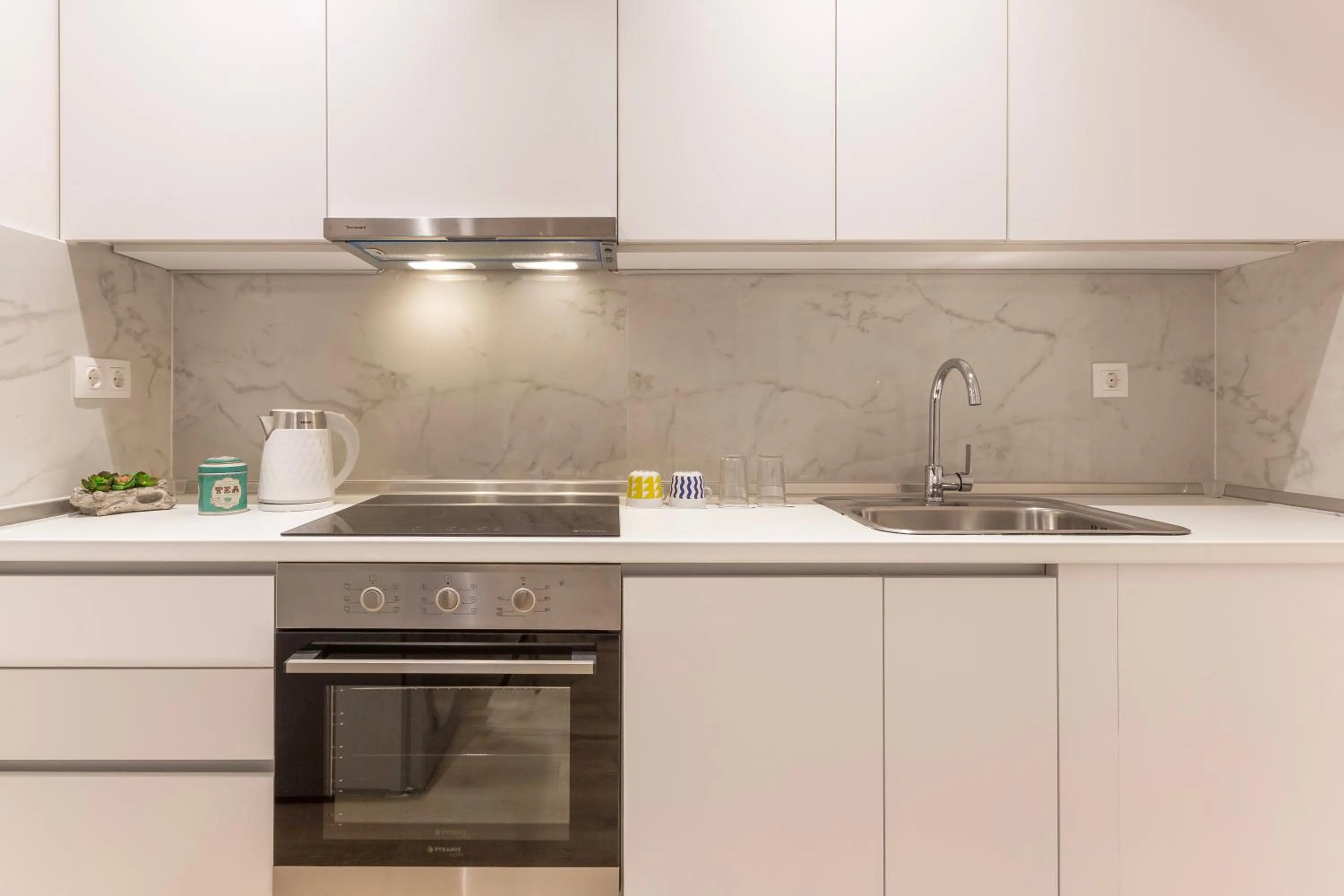 kitchen in The Caravan Apartments
