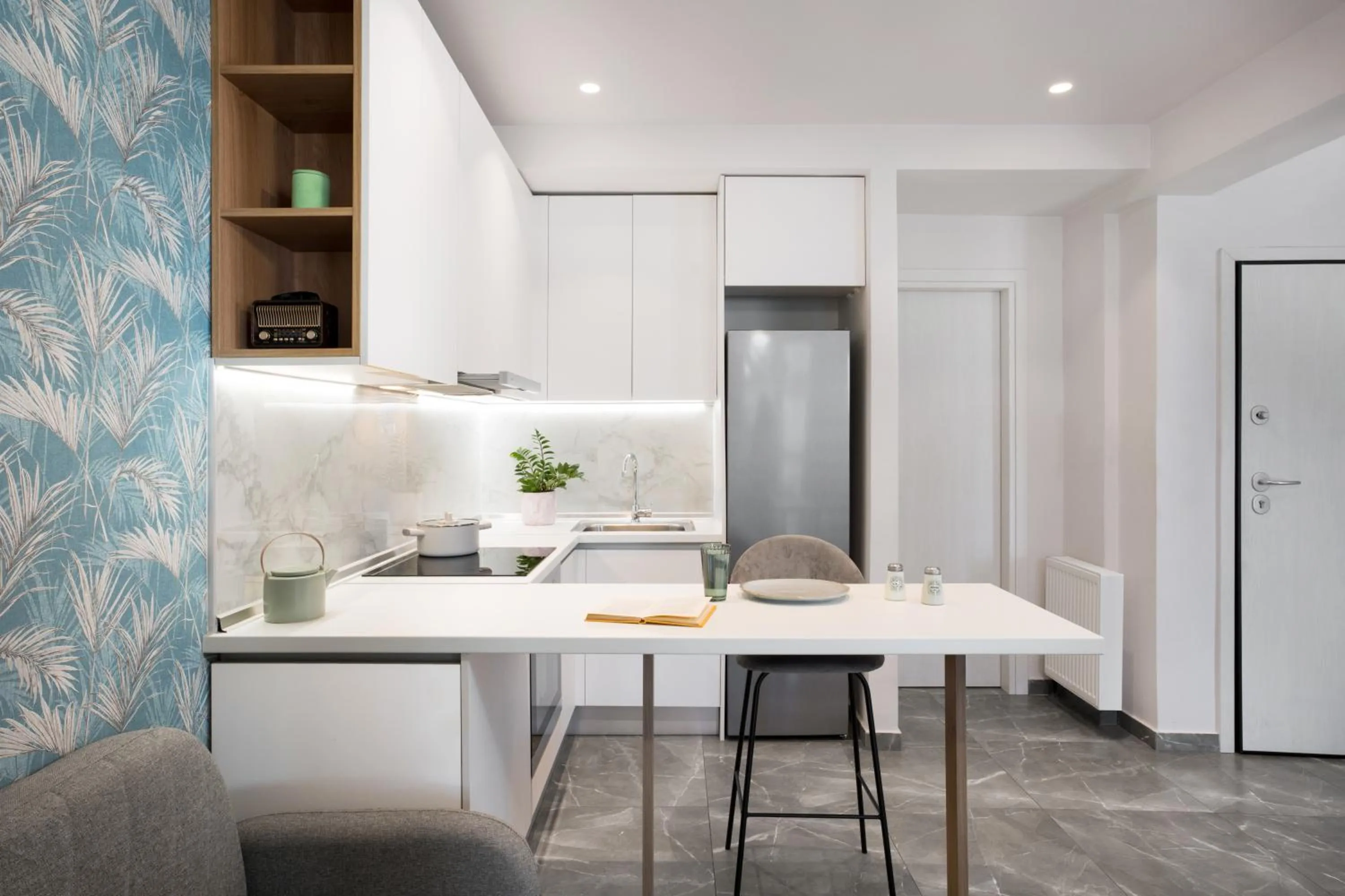 kitchen in The Caravan Apartments