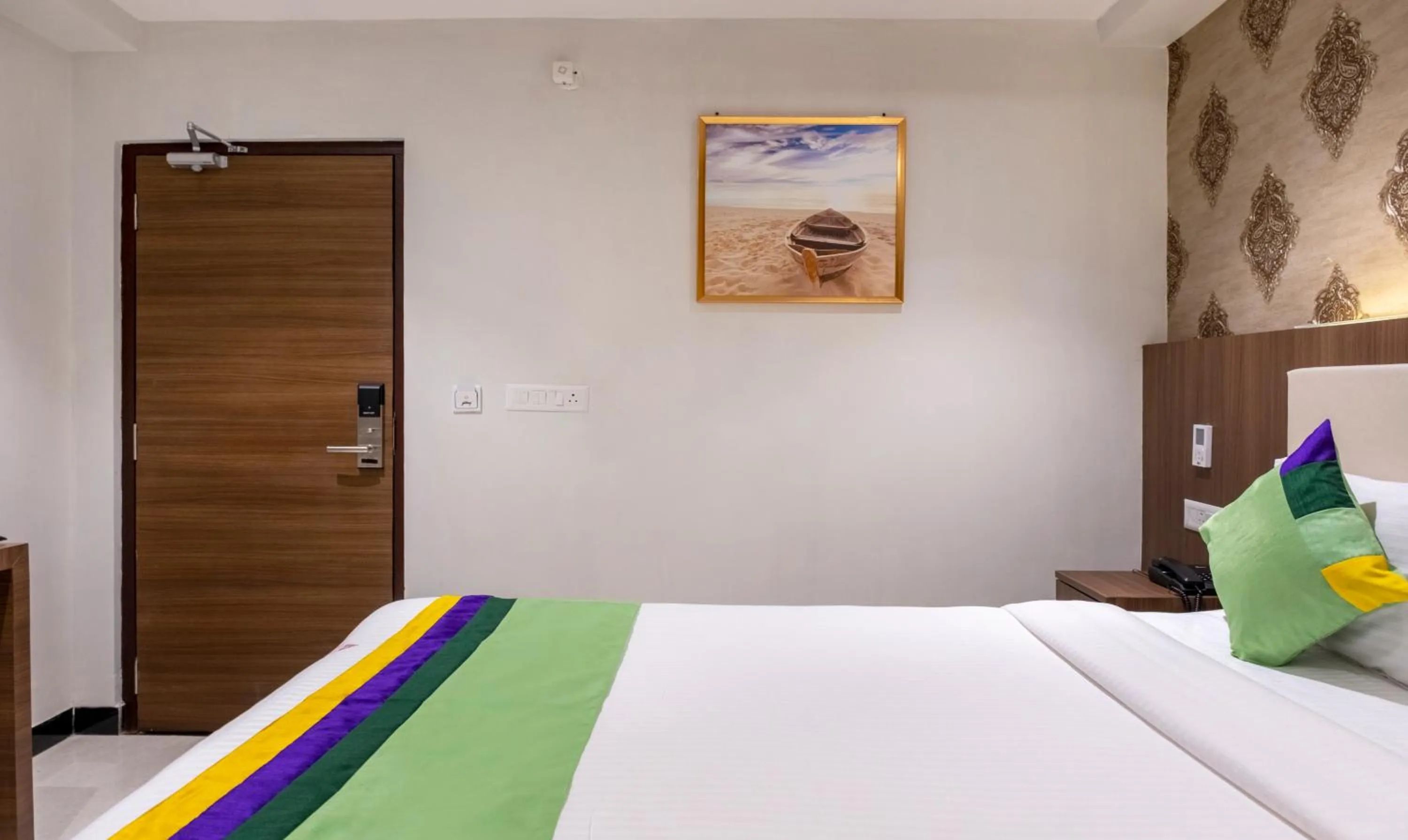 Bedroom, Bed in Treebo Rushi Grand