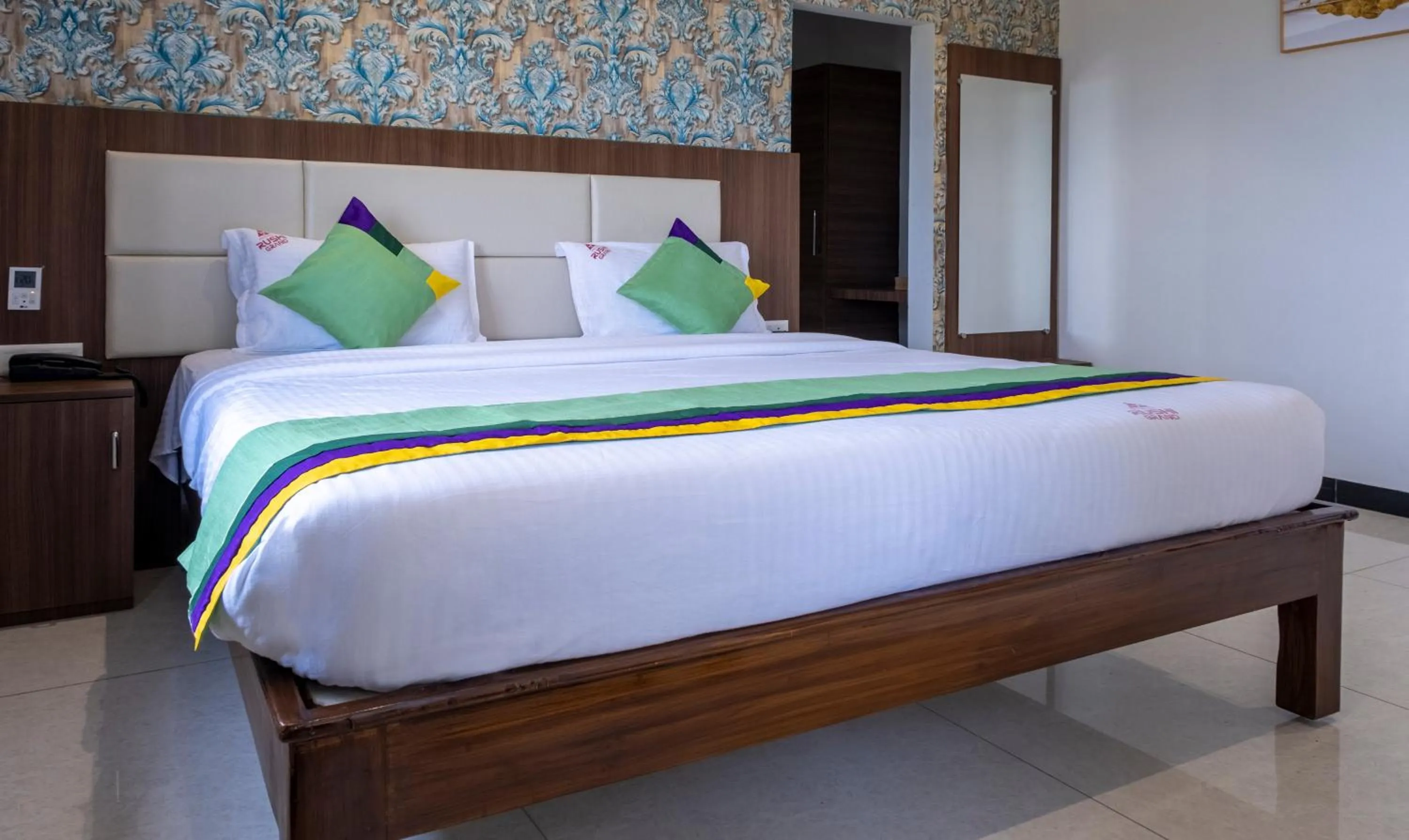 Bedroom, Bed in Treebo Rushi Grand