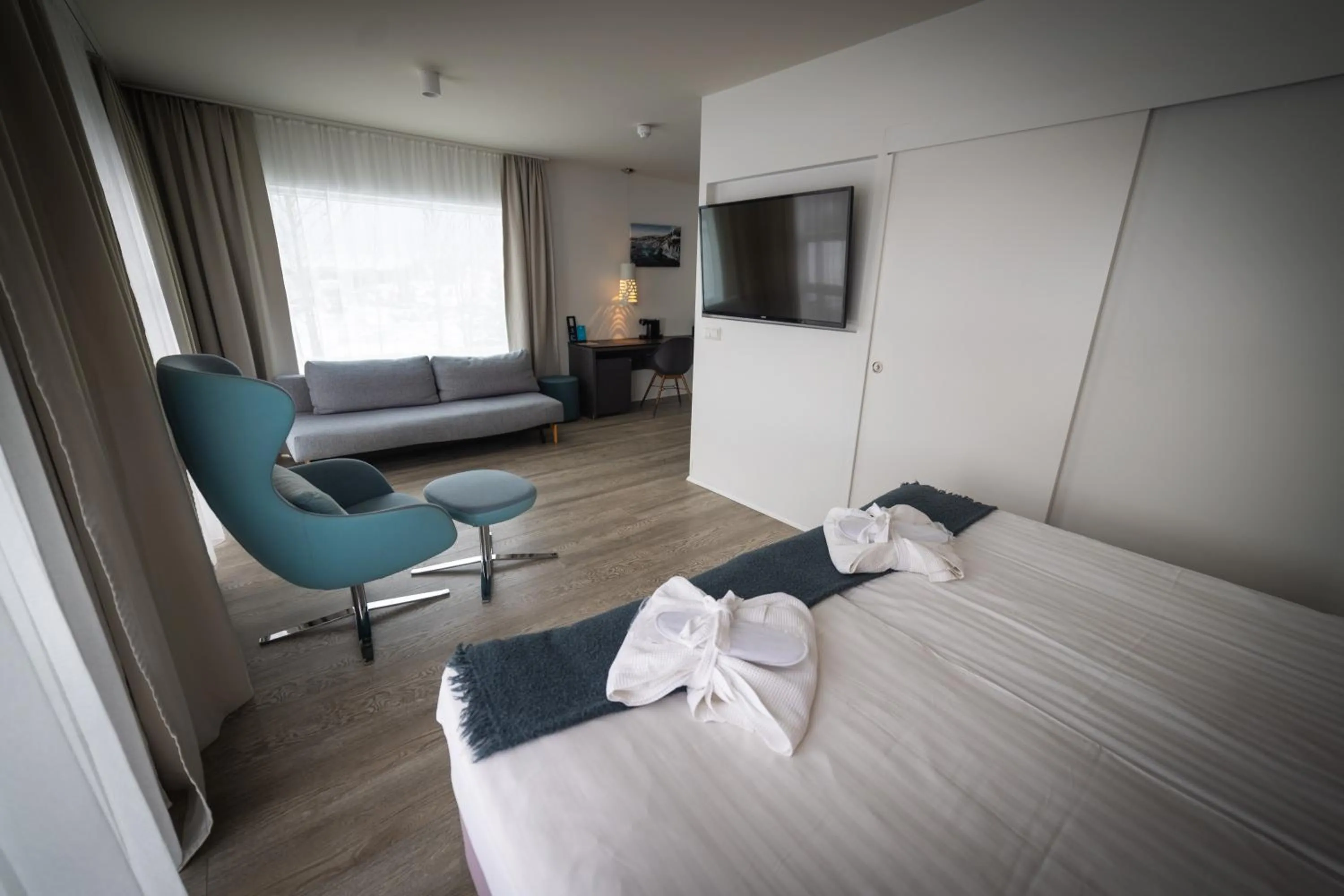 Seating area, Bed in Hotel Hamar