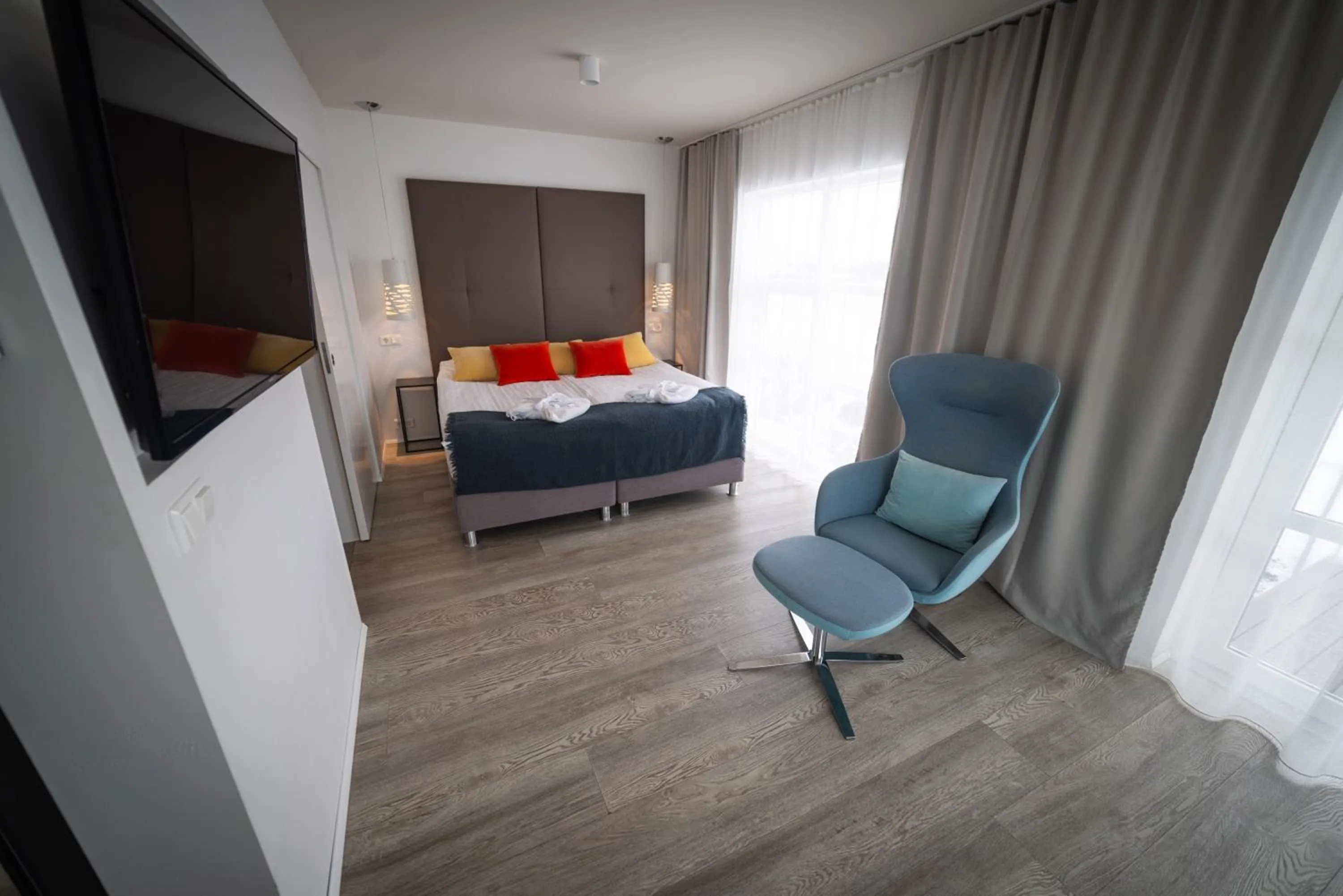 Seating area, Bed in Hotel Hamar