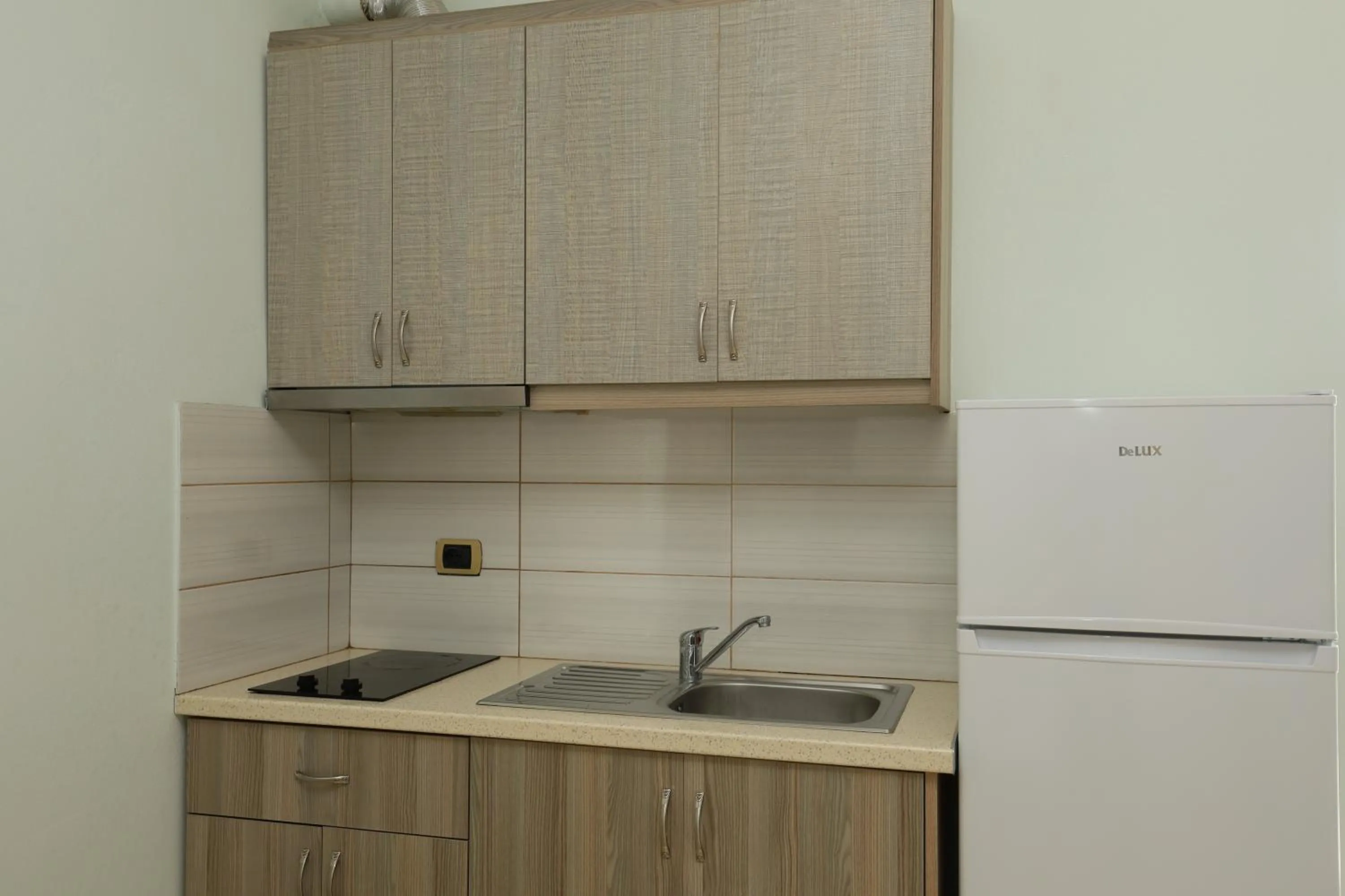 Kitchen or kitchenette in Michelle Apartments