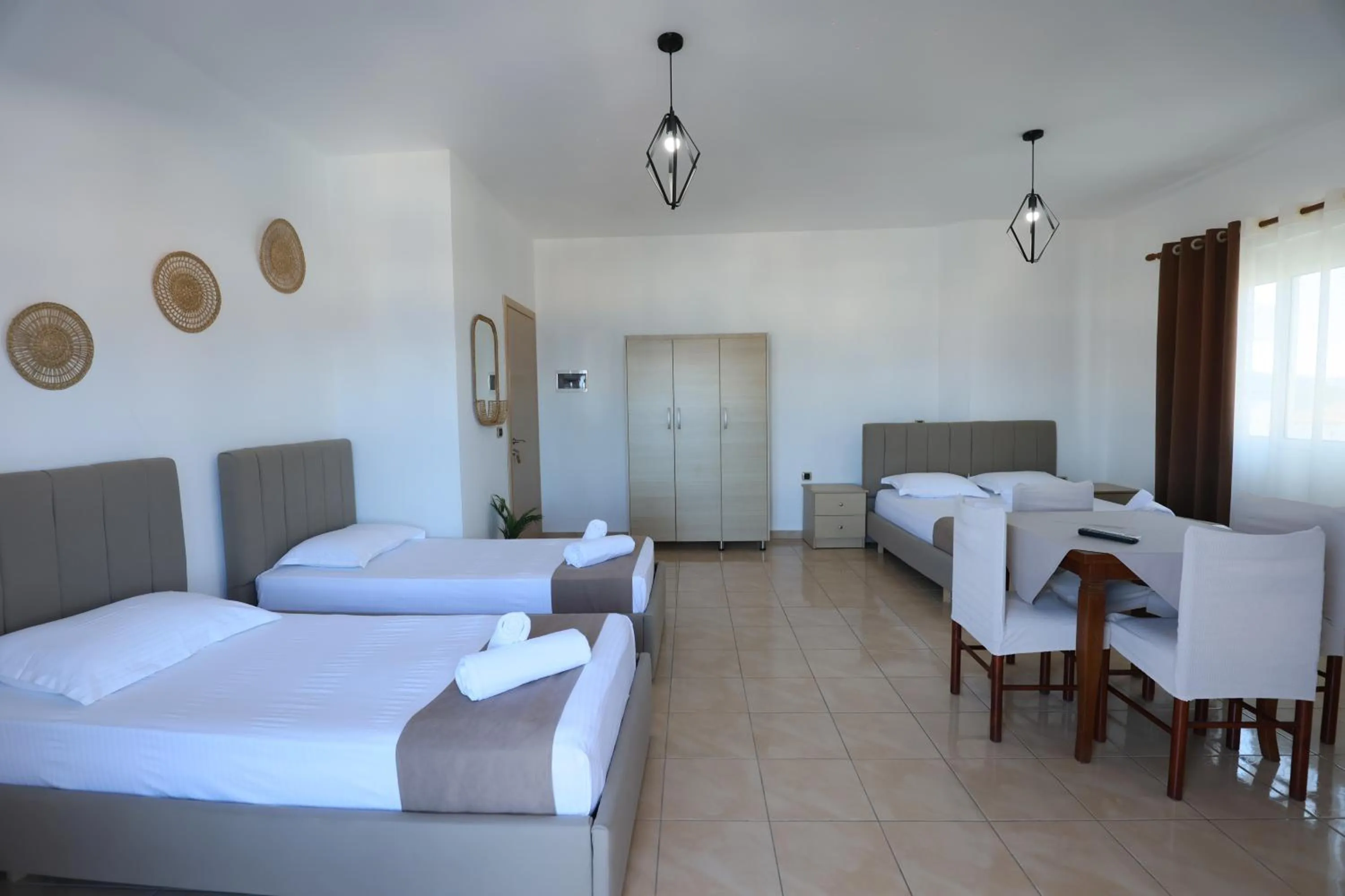 towels, Bed in Michelle Apartments