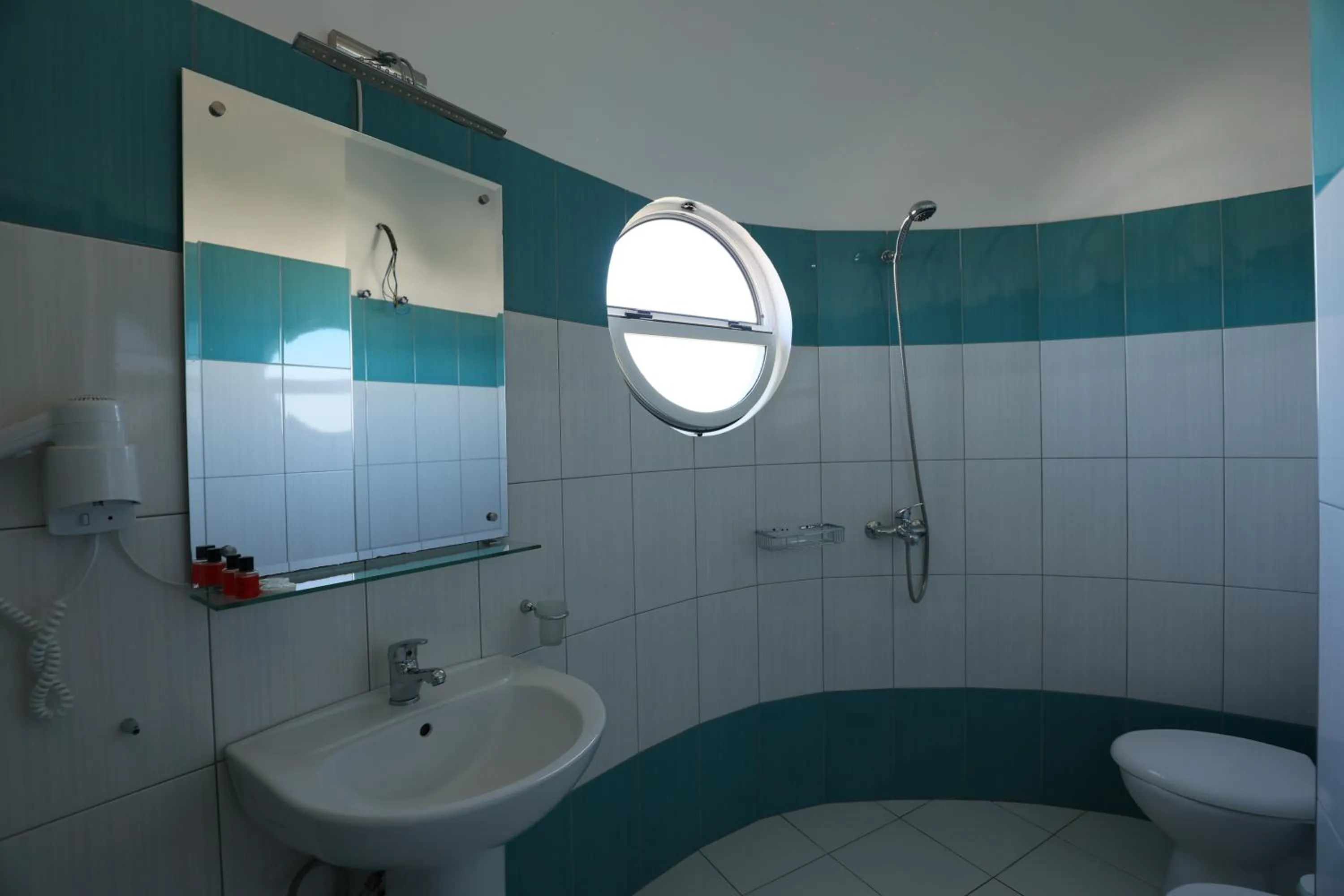 Toilet in Michelle Apartments