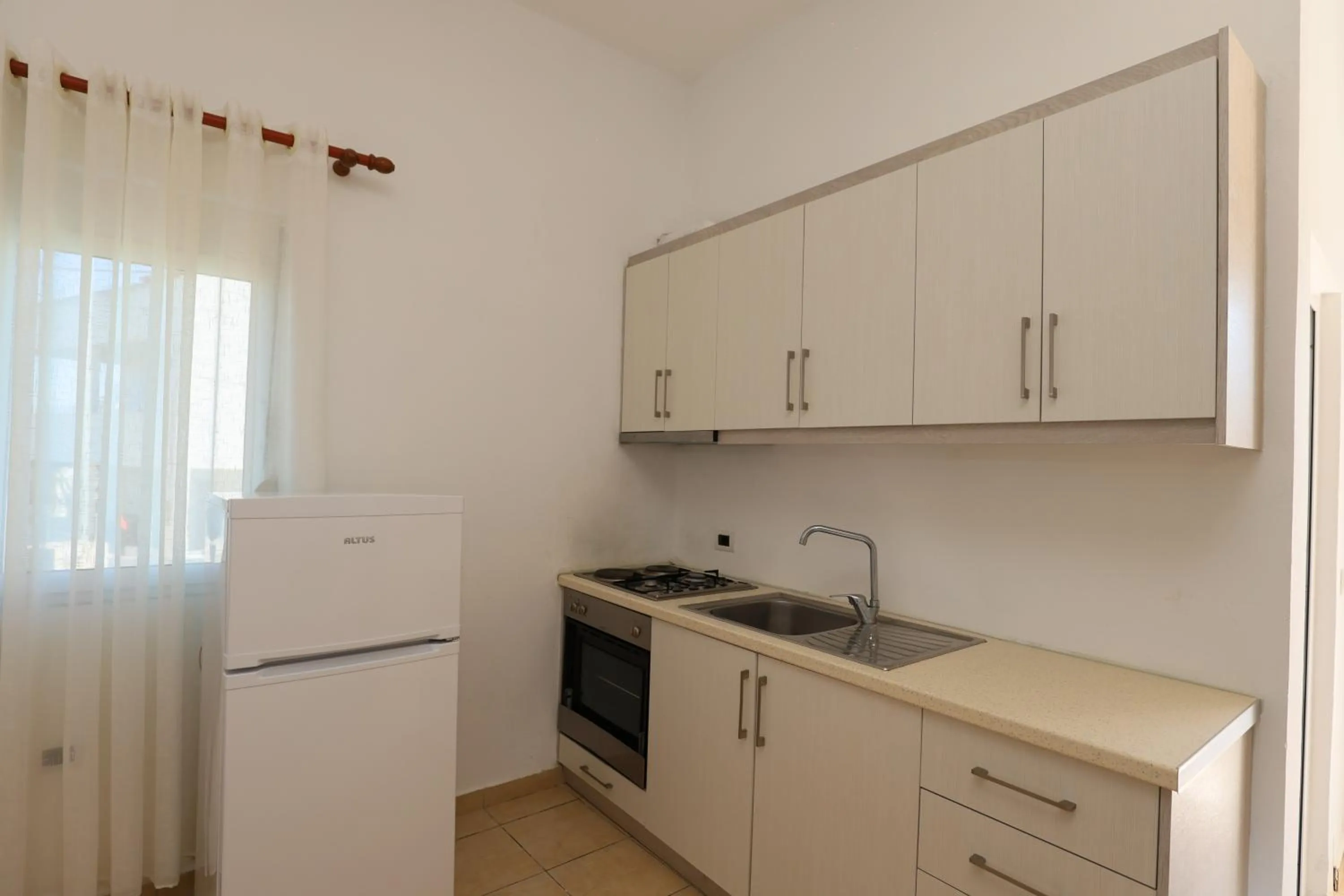 Kitchen or kitchenette in Michelle Apartments