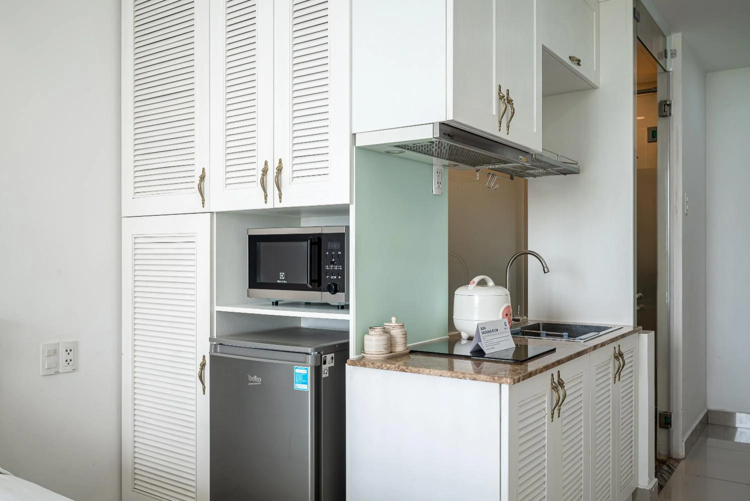 Kitchen or kitchenette in Cozrum Homes - Sonata Residence