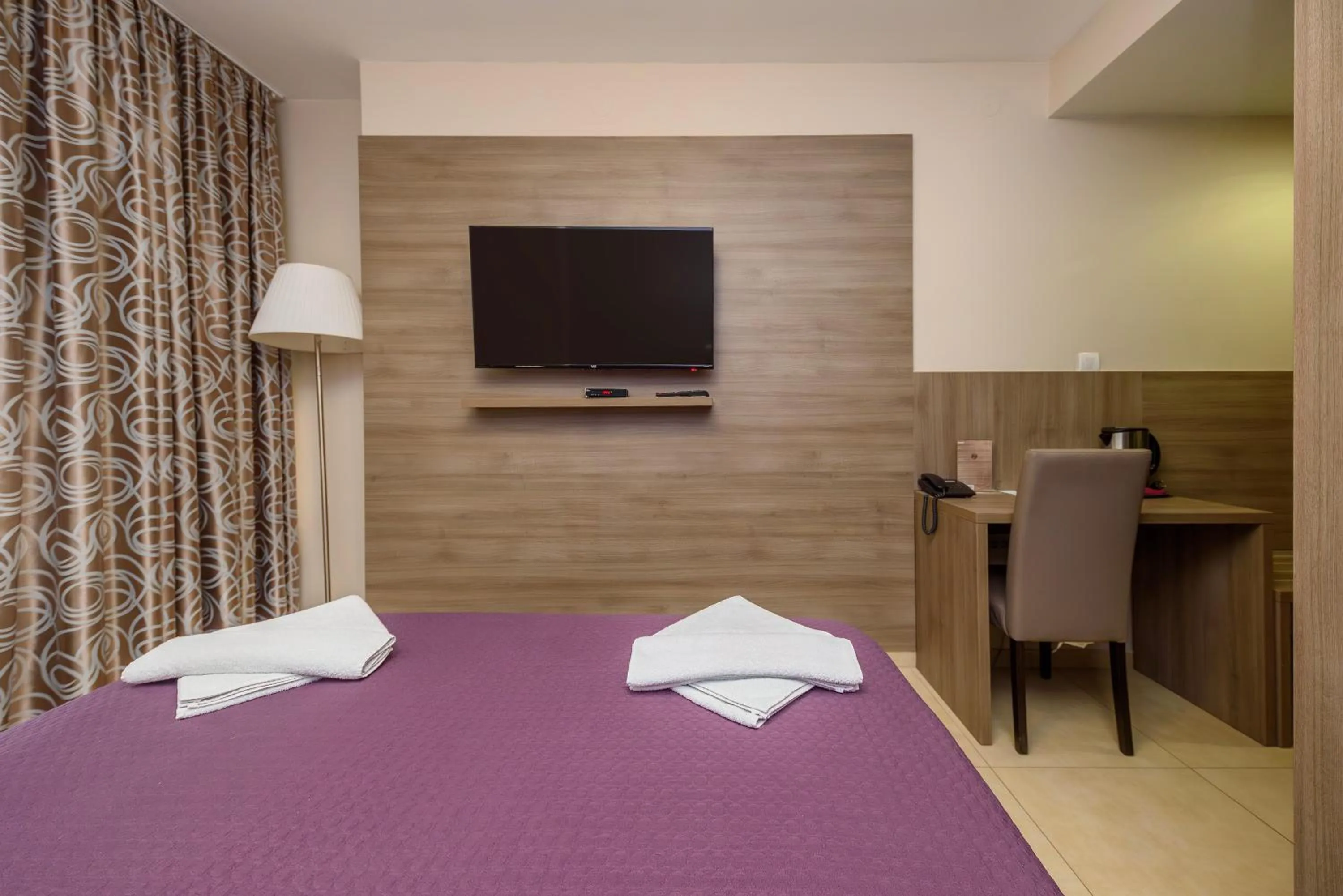 Bed in Garni Hotel Zenit