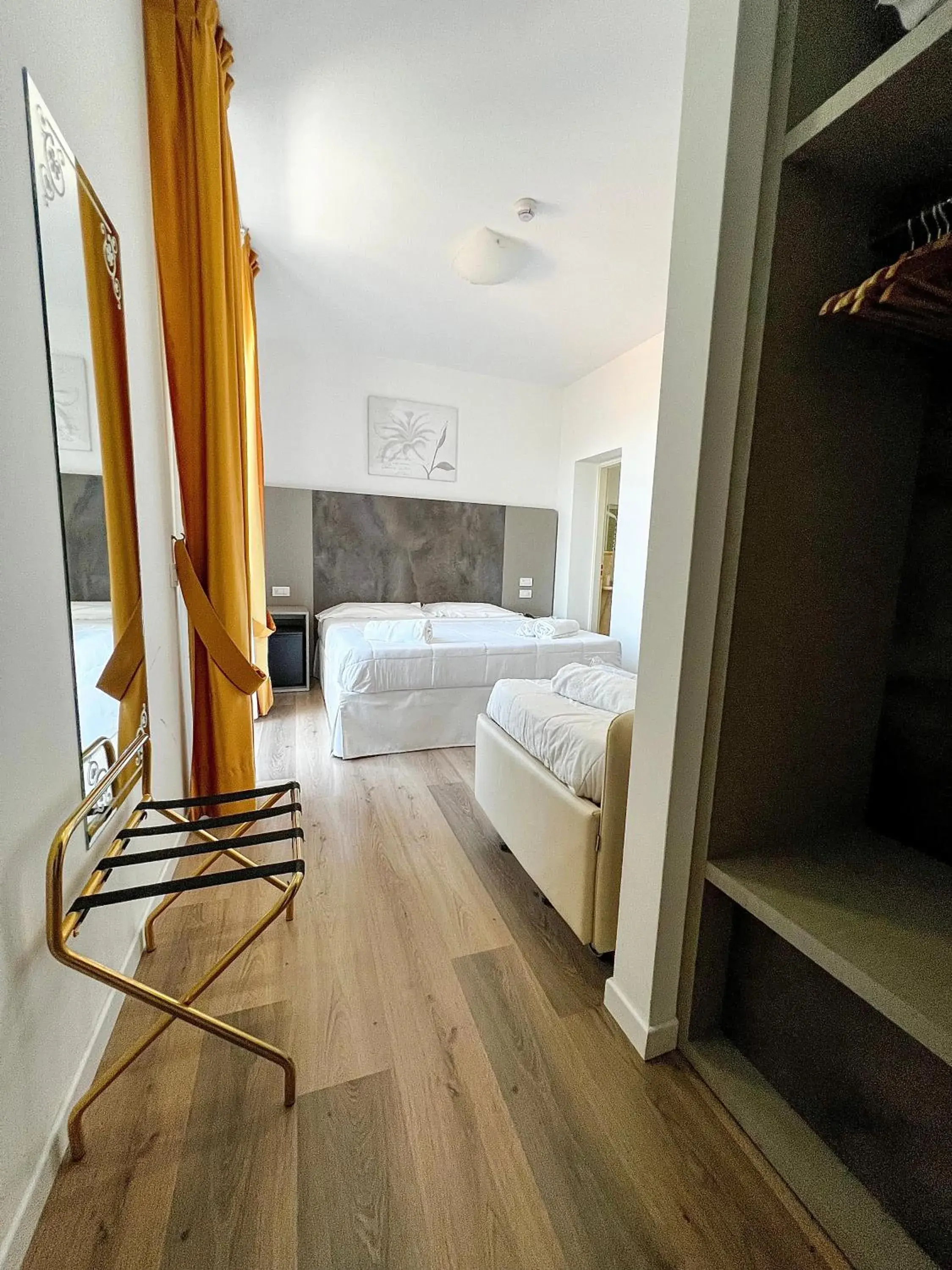 Triple Room in Hotel Joli Triple Room in Hotel Joli