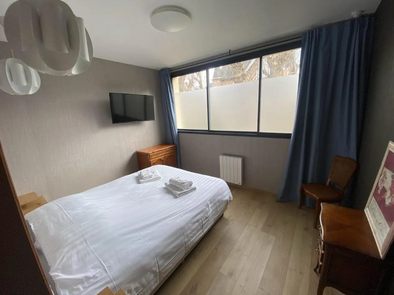 Bed in Parc Beausejour Aparthotel