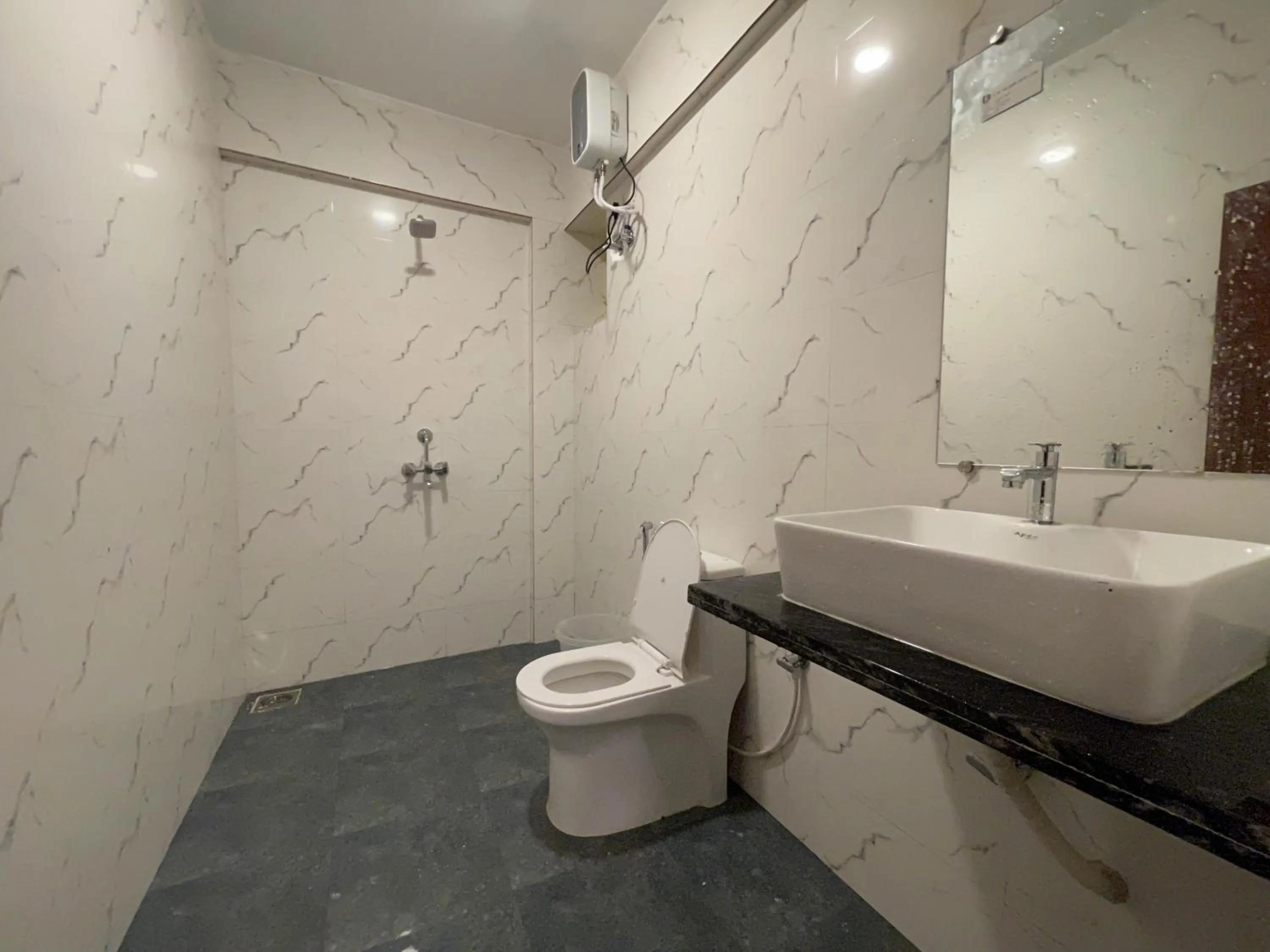 Shower in Yellow Sky By Rj14, Baga Beach