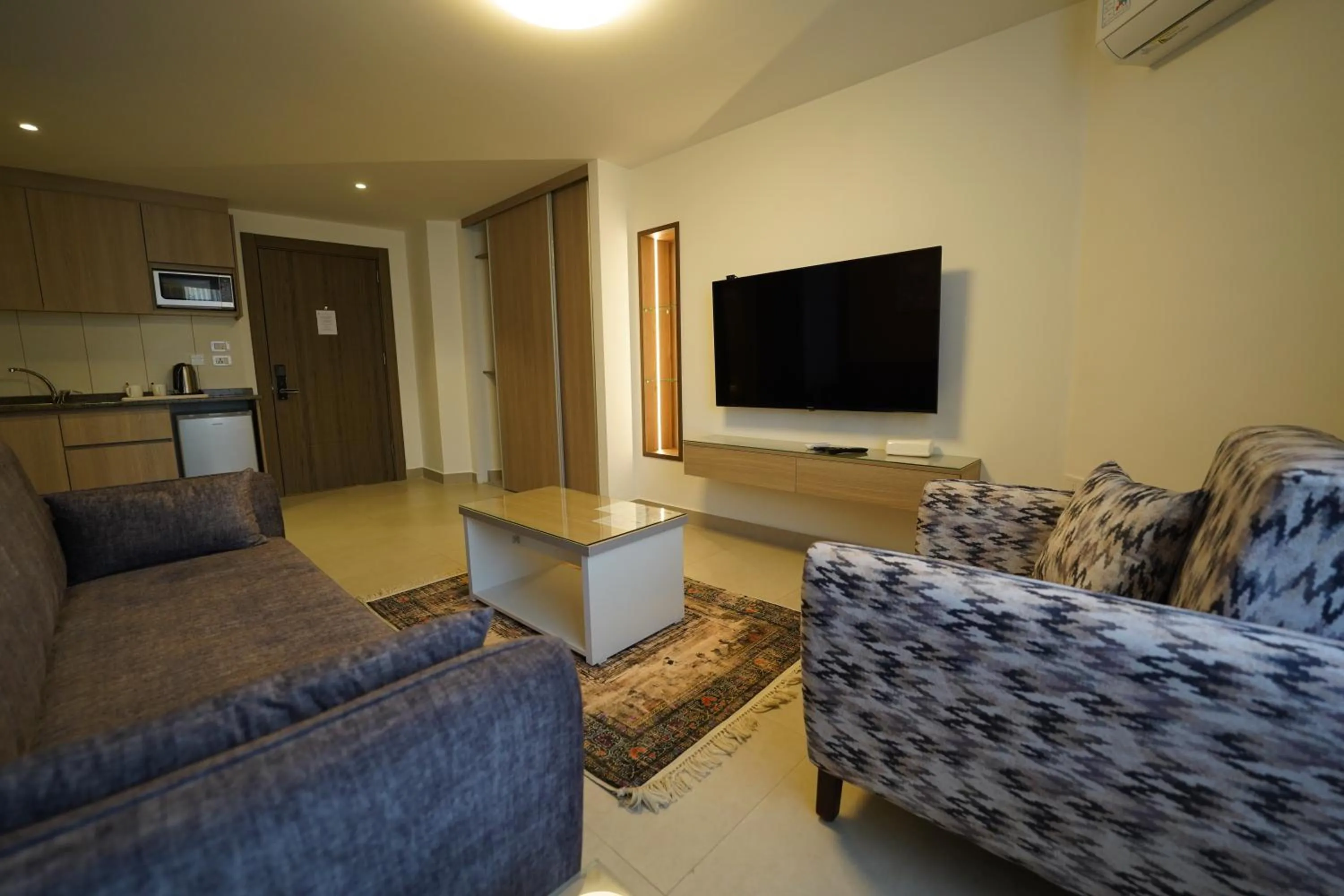 Living room in Red Carpet Hotel & Suites