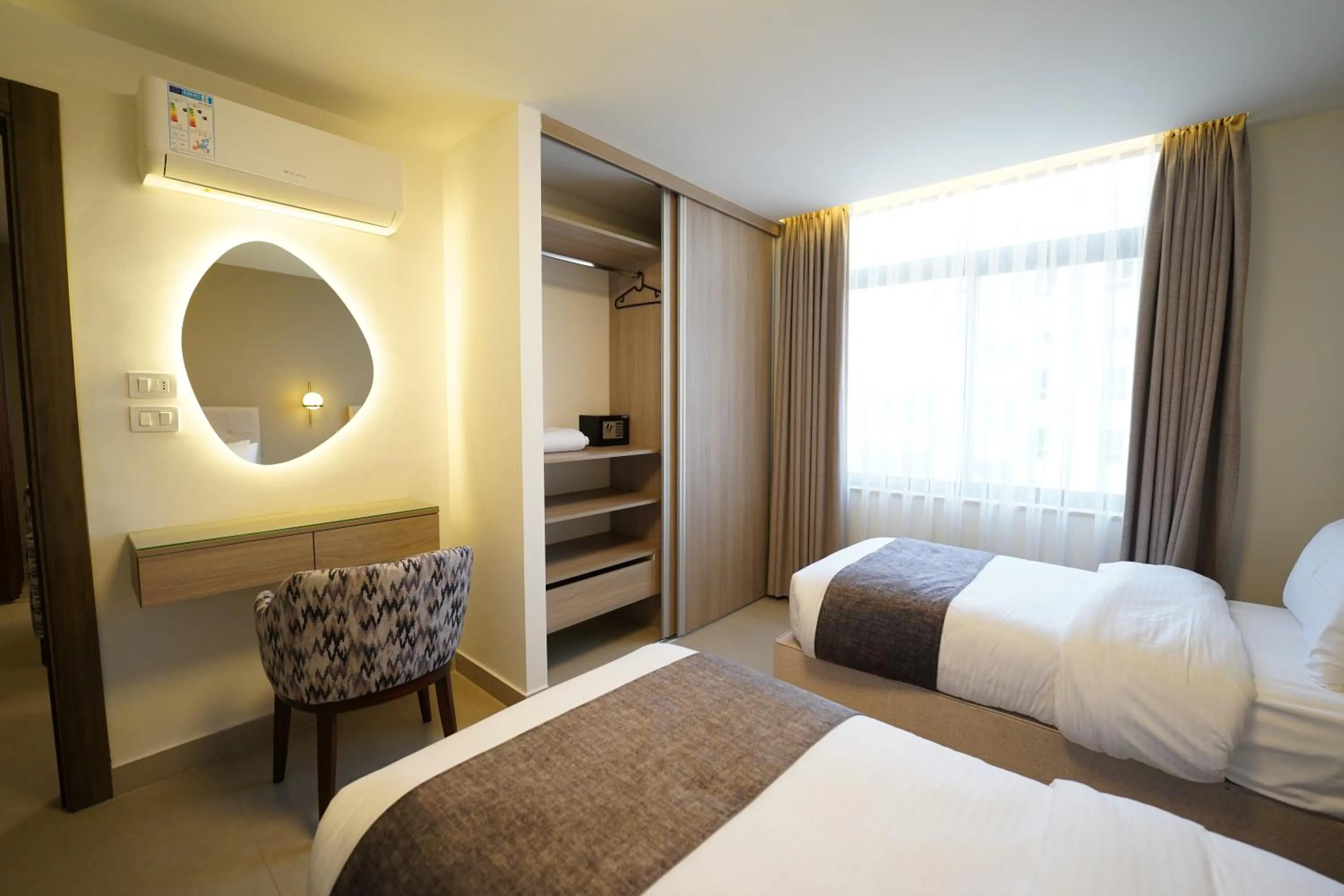 Photo of the whole room, Bed in Red Carpet Hotel & Suites