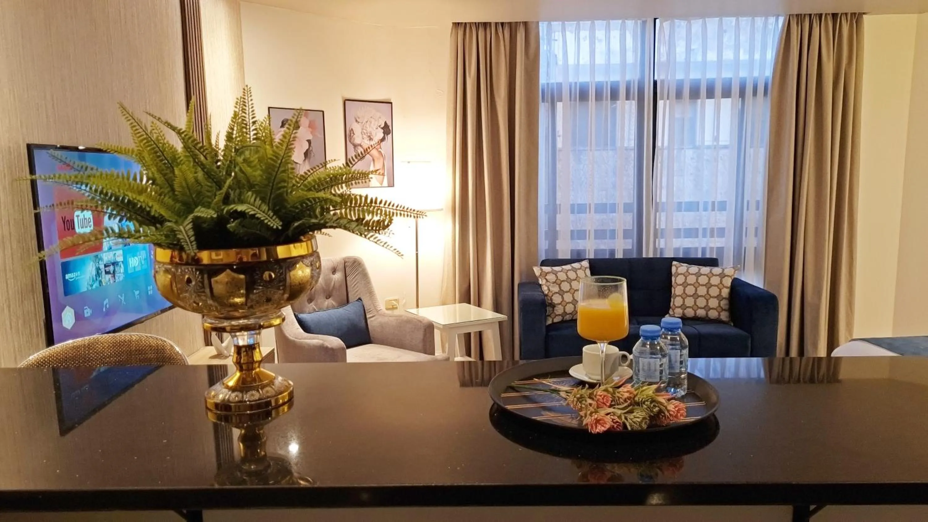 Seating area in Red Carpet Hotel & Suites