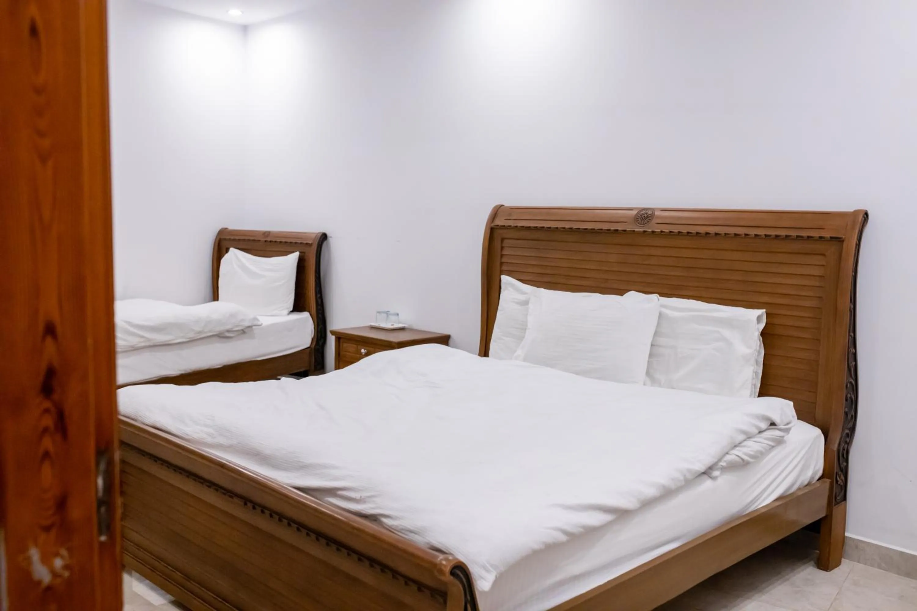 Photo of the whole room, Bed in Regal Residency